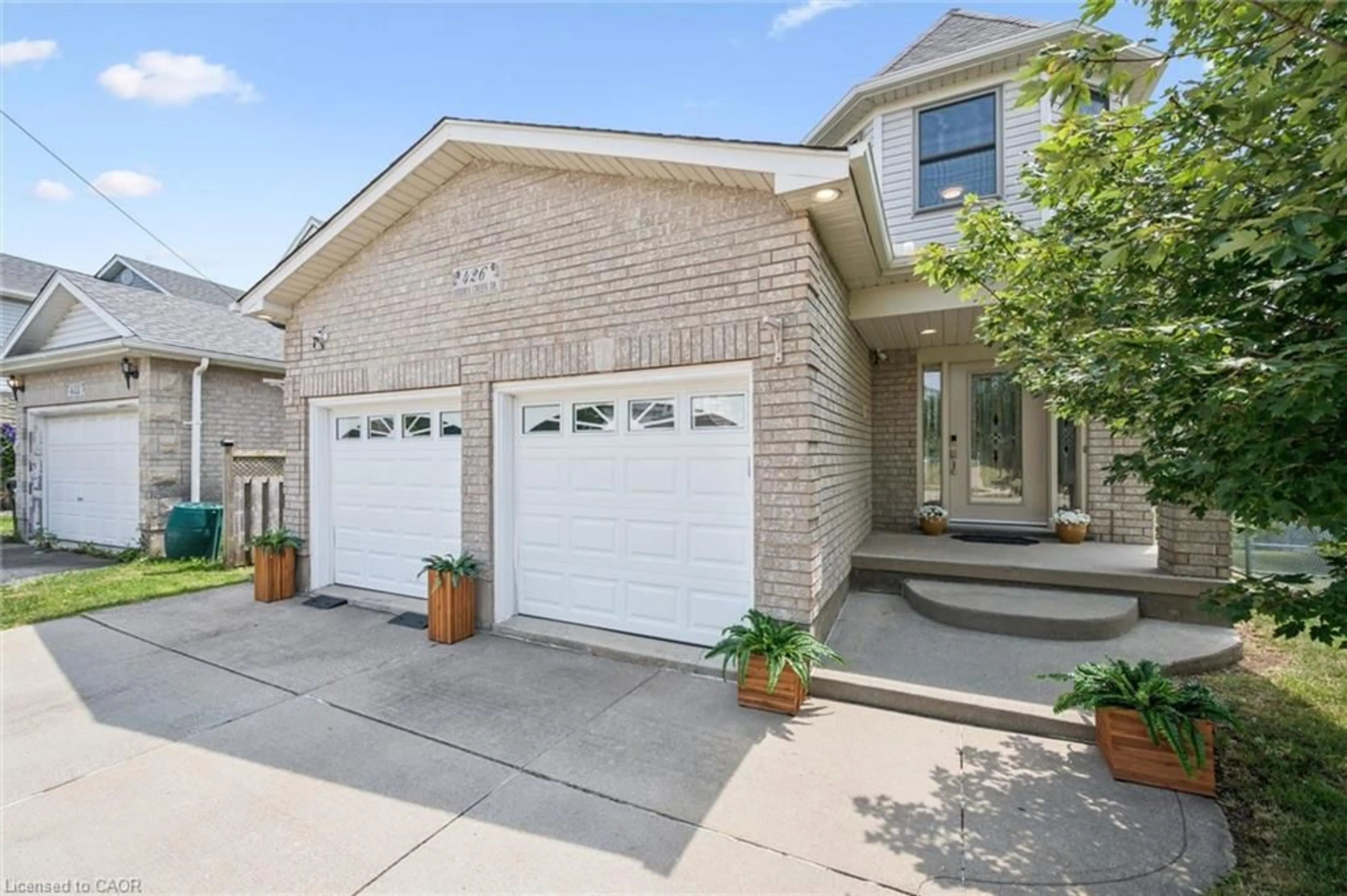 Home with brick exterior material, street for 426 Hidden Creek Dr, Kitchener Ontario N2N 3N2