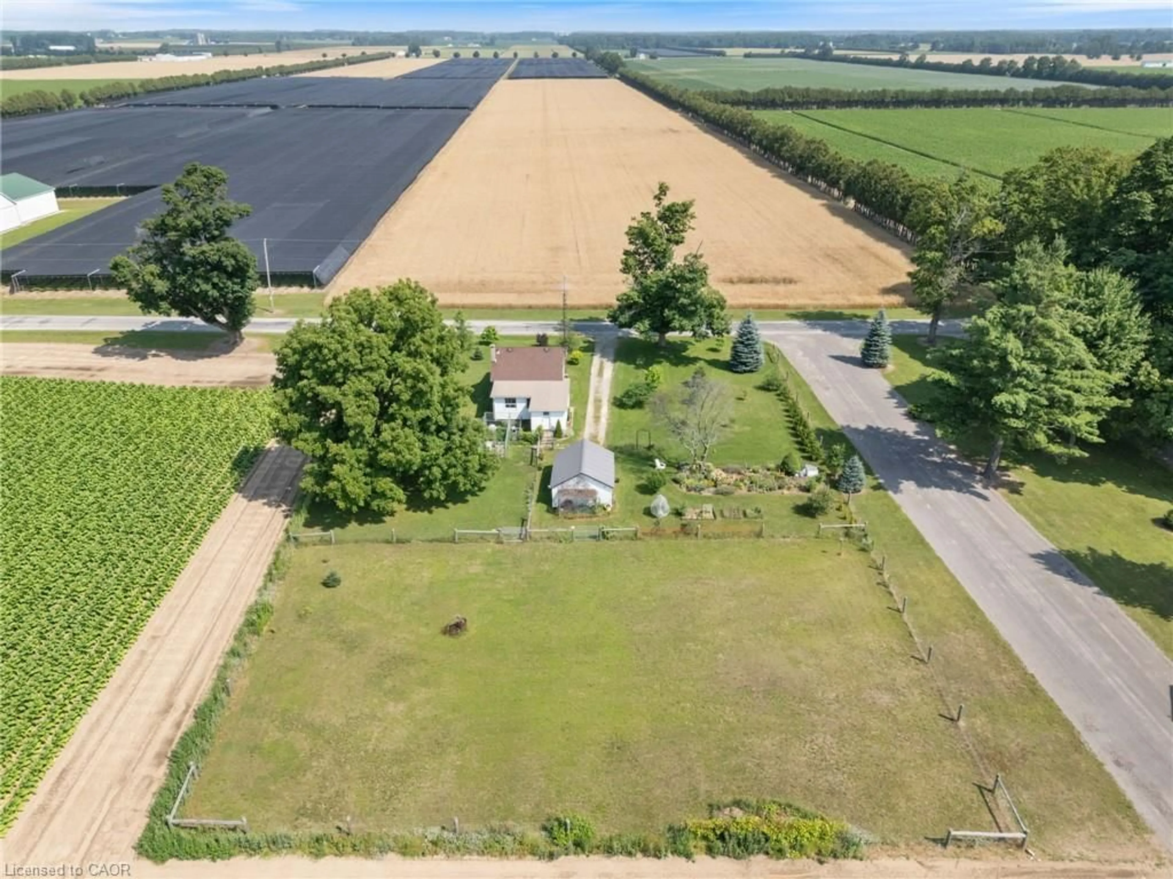 A pic from outside/outdoor area/front of a property/back of a property/a pic from drone, unknown for 392 Windham Road 7, La Salette Ontario N0E 1H0