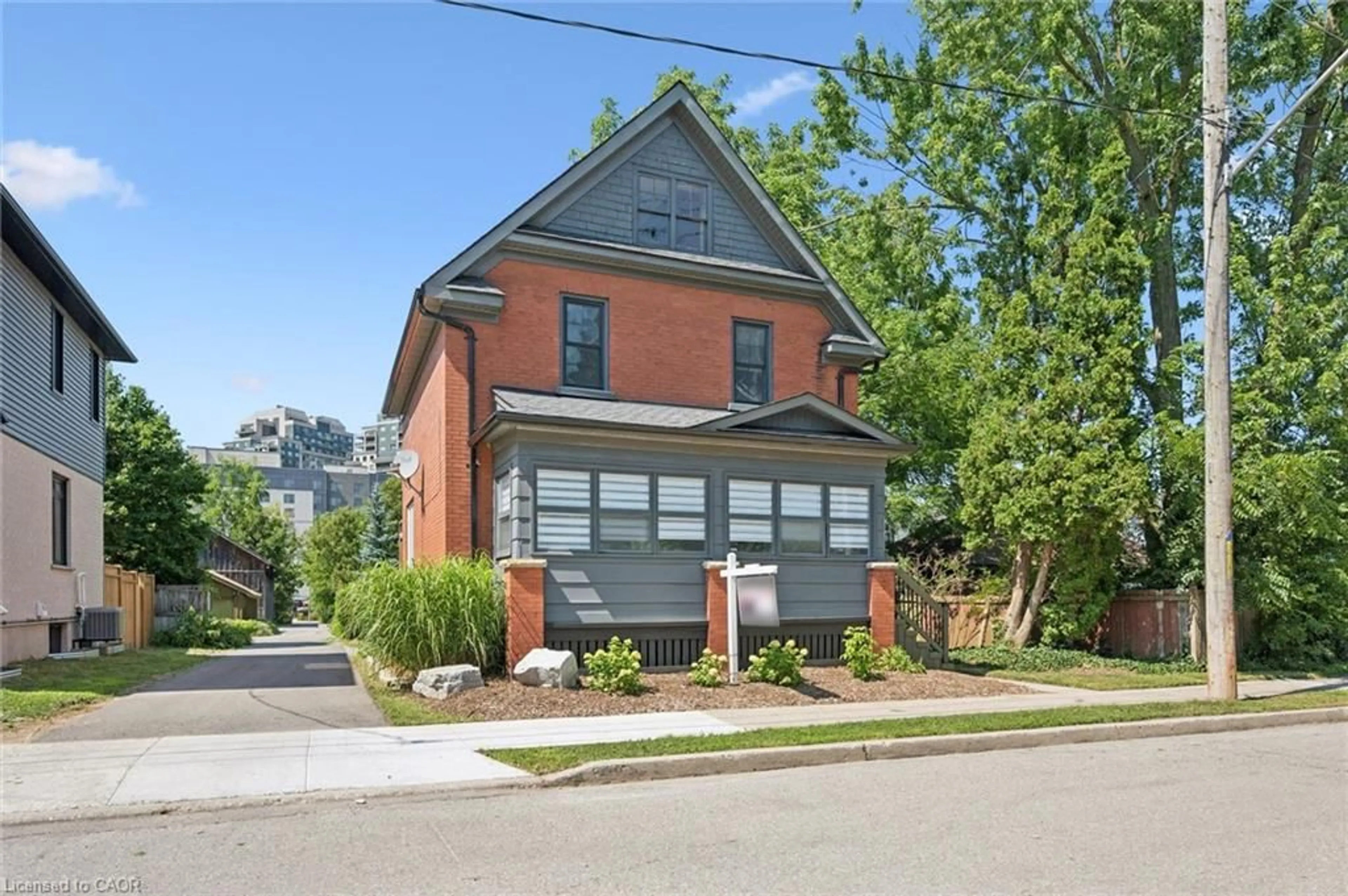 Home with brick exterior material, street for 100 Dawson St, Waterloo Ontario N2L 1R4