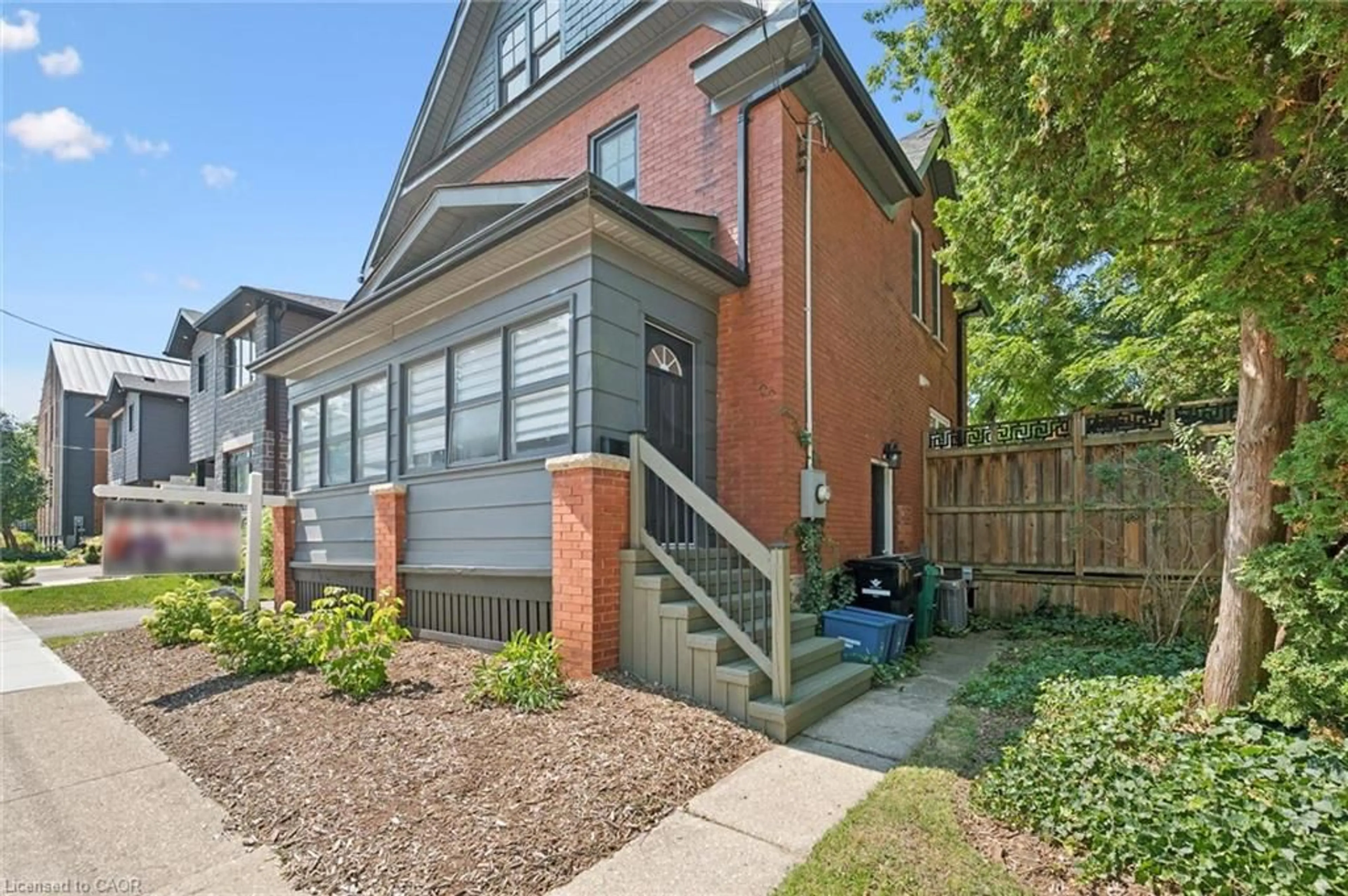 Home with brick exterior material, street for 100 Dawson St, Waterloo Ontario N2L 1R4