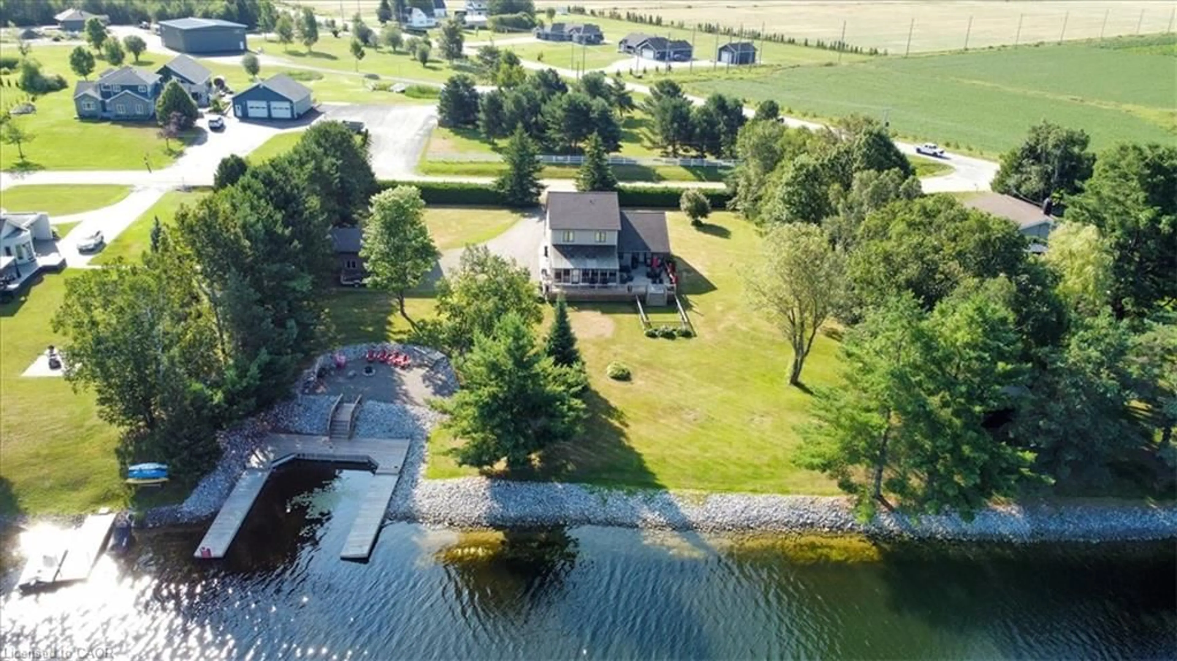 A pic from outside/outdoor area/front of a property/back of a property/a pic from drone, water/lake/river/ocean view for 411 Champagne Rd, Sturgeon Falls Ontario P2B 2L9