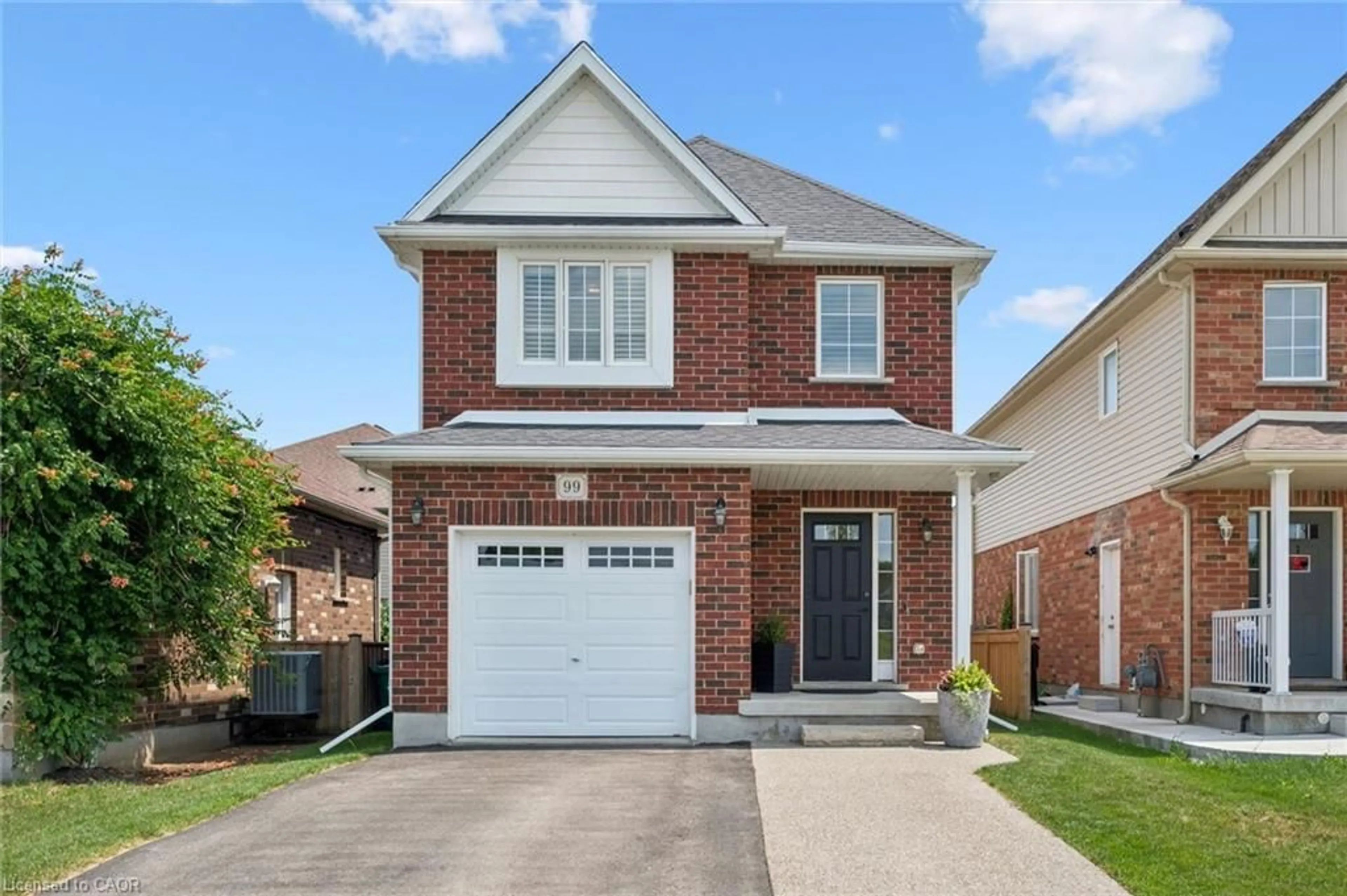 Home with brick exterior material, street for 99 Country Club Estates Dr, Elmira Ontario N3B 0B4