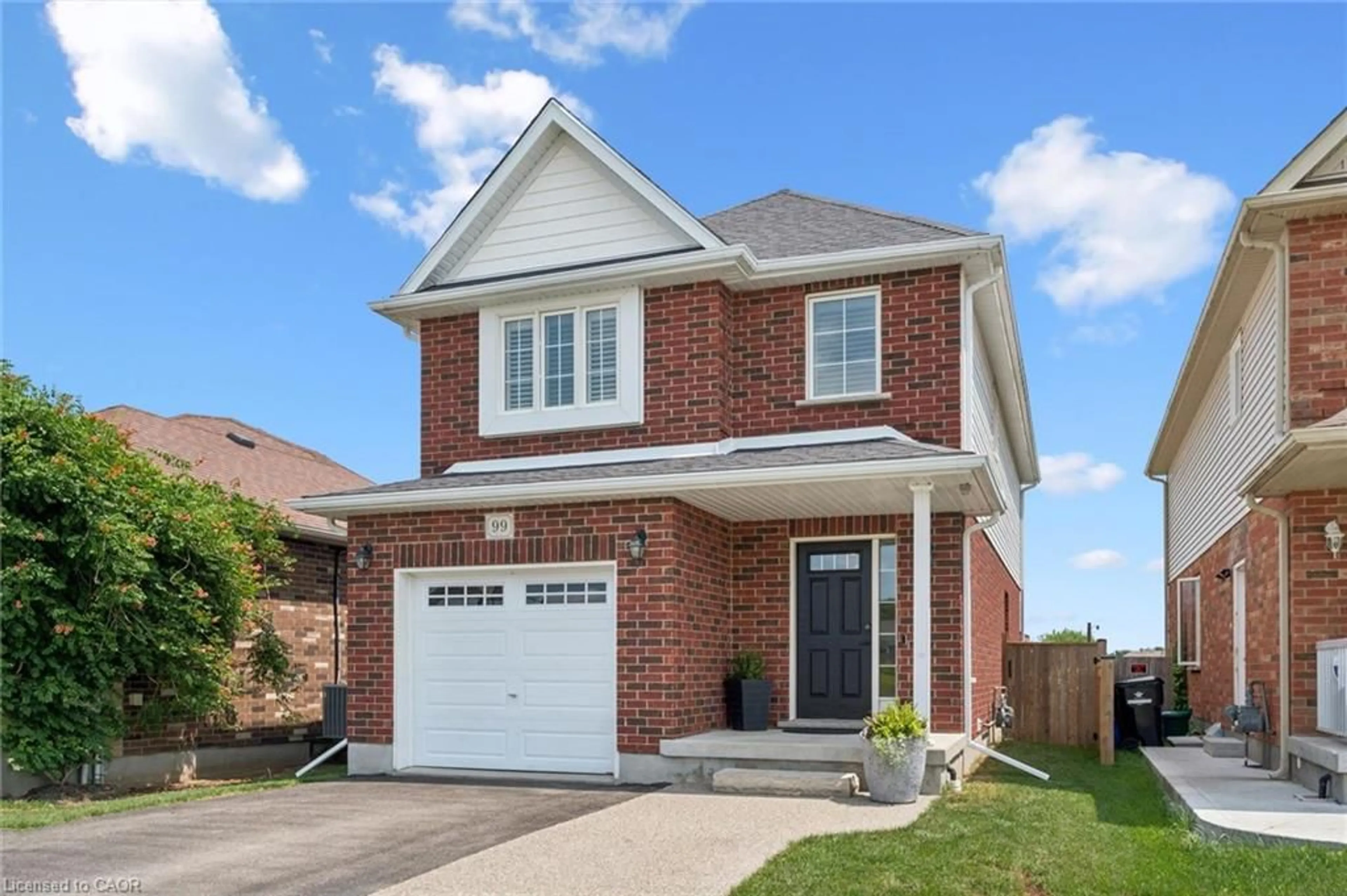 Home with brick exterior material, street for 99 Country Club Estates Dr, Elmira Ontario N3B 0B4