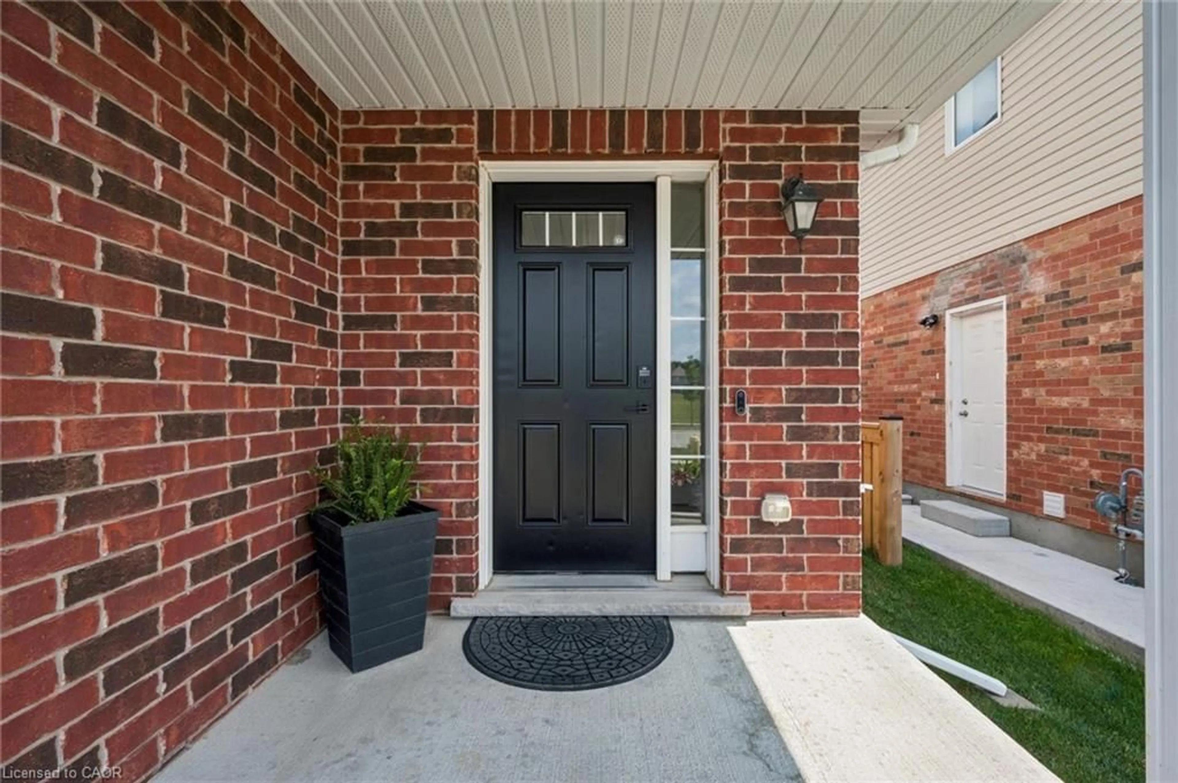 Home with brick exterior material, street for 99 Country Club Estates Dr, Elmira Ontario N3B 0B4