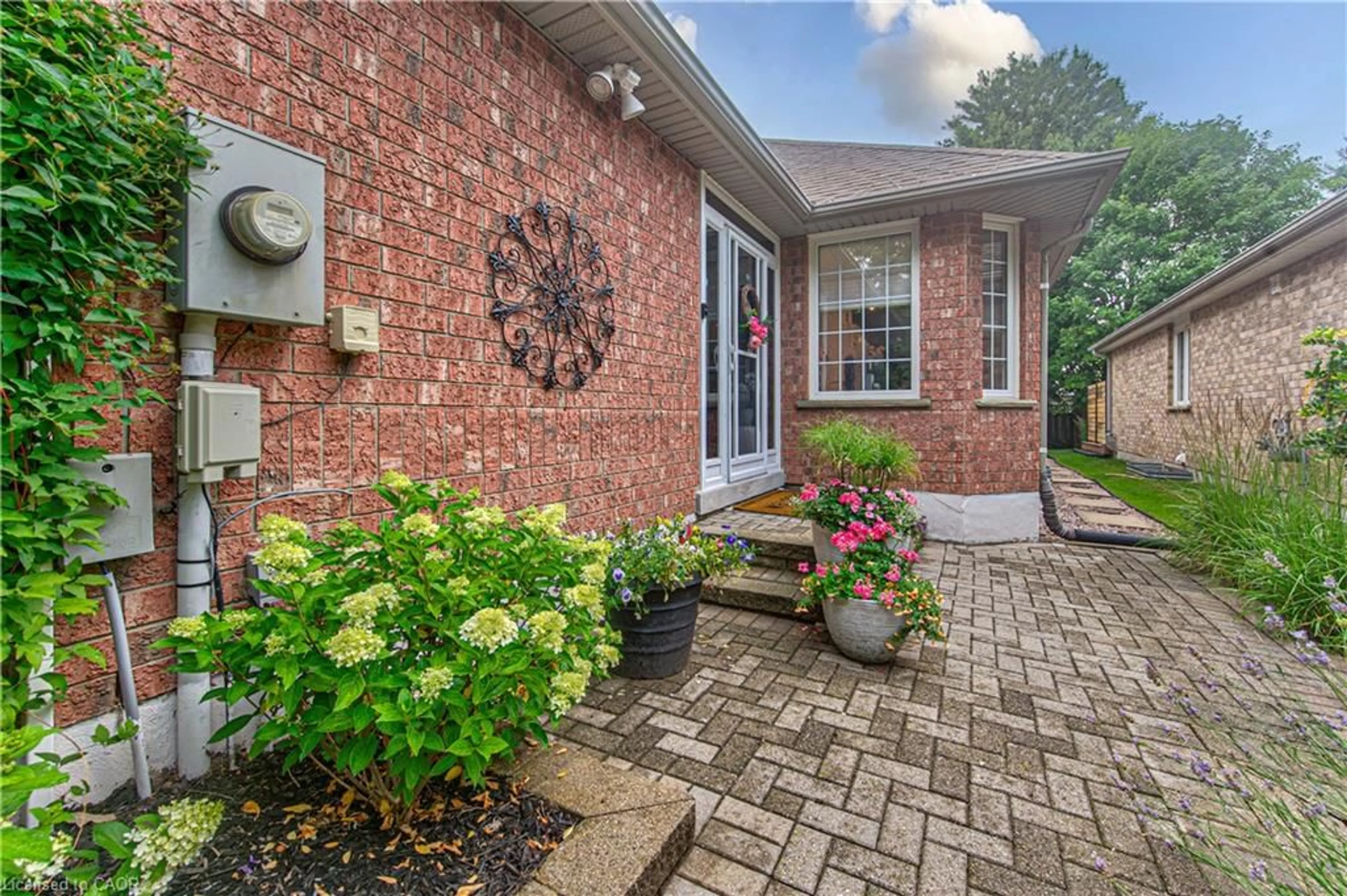 Home with brick exterior material, street for 418 Sandbanks Cres, Waterloo Ontario N2V 2H2