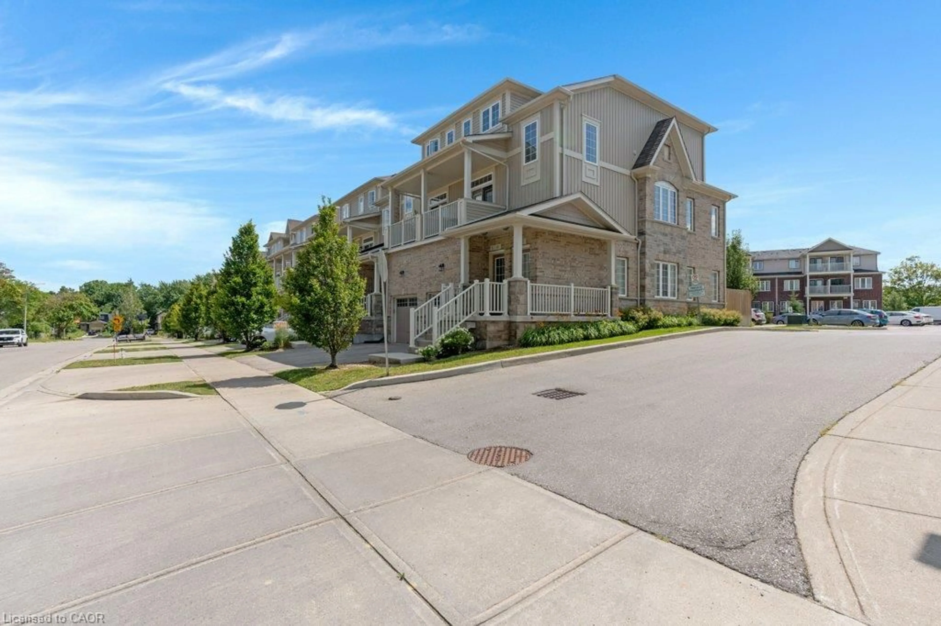 A pic from outside/outdoor area/front of a property/back of a property/a pic from drone, unknown for 397 Westwood Dr #B, Kitchener Ontario N2M 0B5