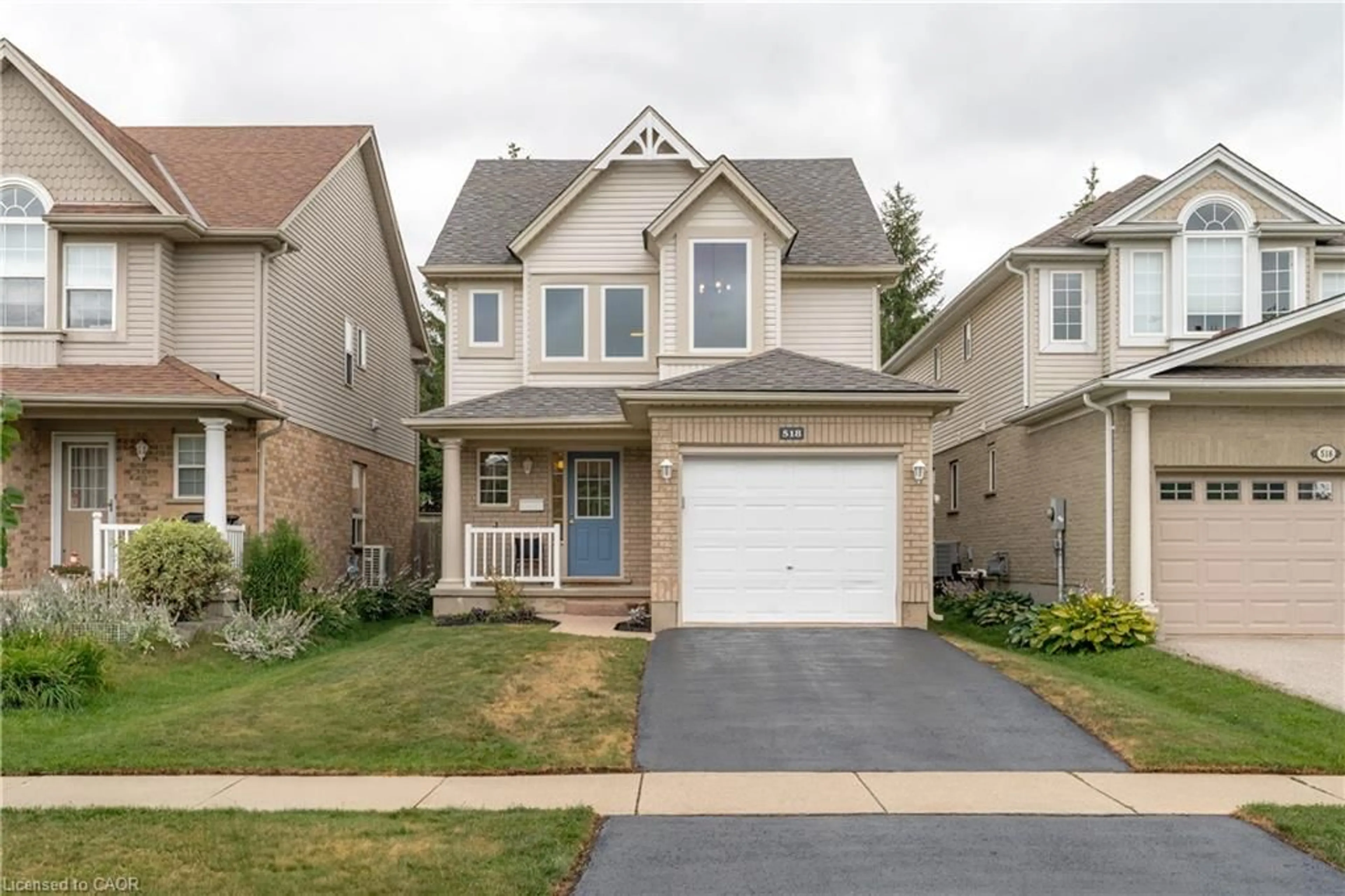 Home with brick exterior material, street for 518 Brookmill Cres, Waterloo Ontario N2V 2M1