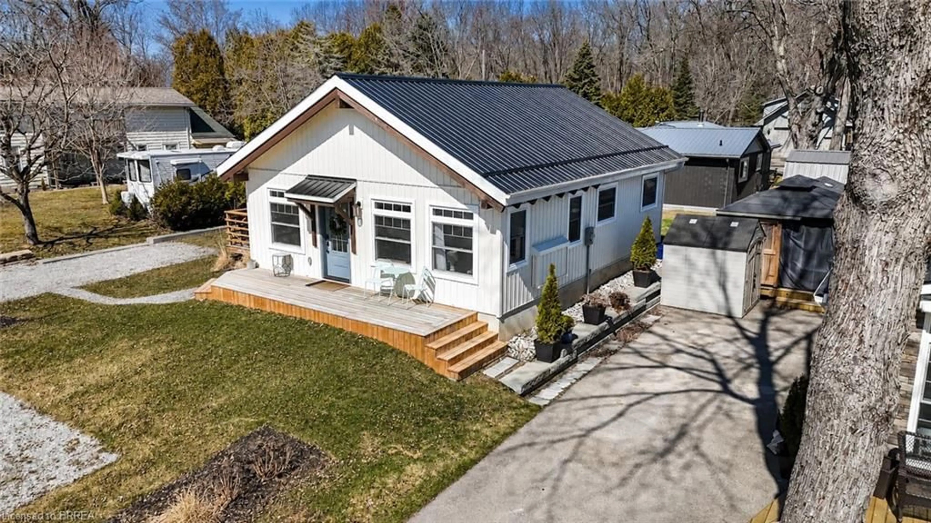 Home with vinyl exterior material, street for 7 Pellum St, Turkey Point Ontario N0E 1T0