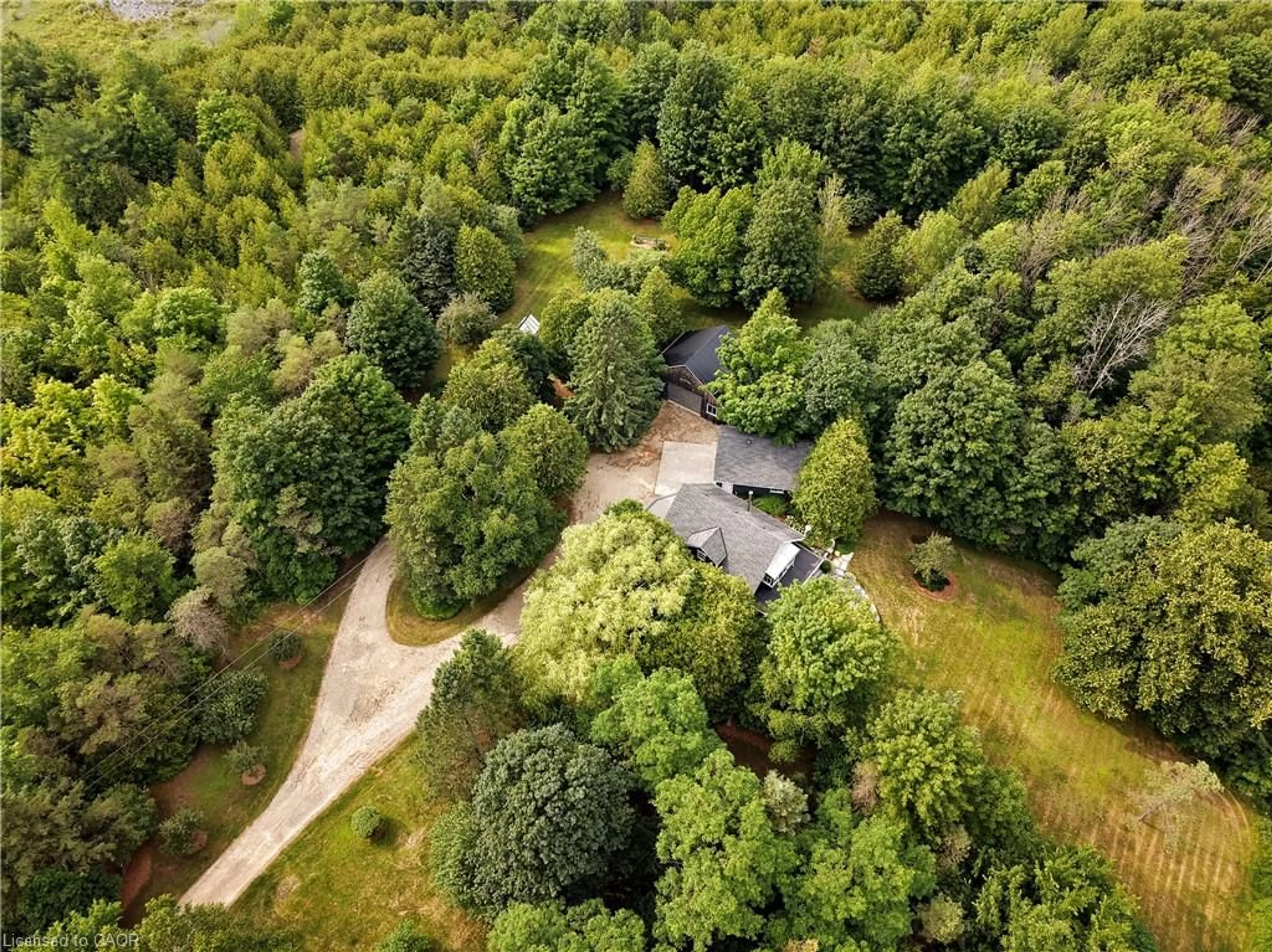 A pic from outside/outdoor area/front of a property/back of a property/a pic from drone, forest/trees view for 123083 Southgate Rd 12, Wellington North Ontario N0G 2L0