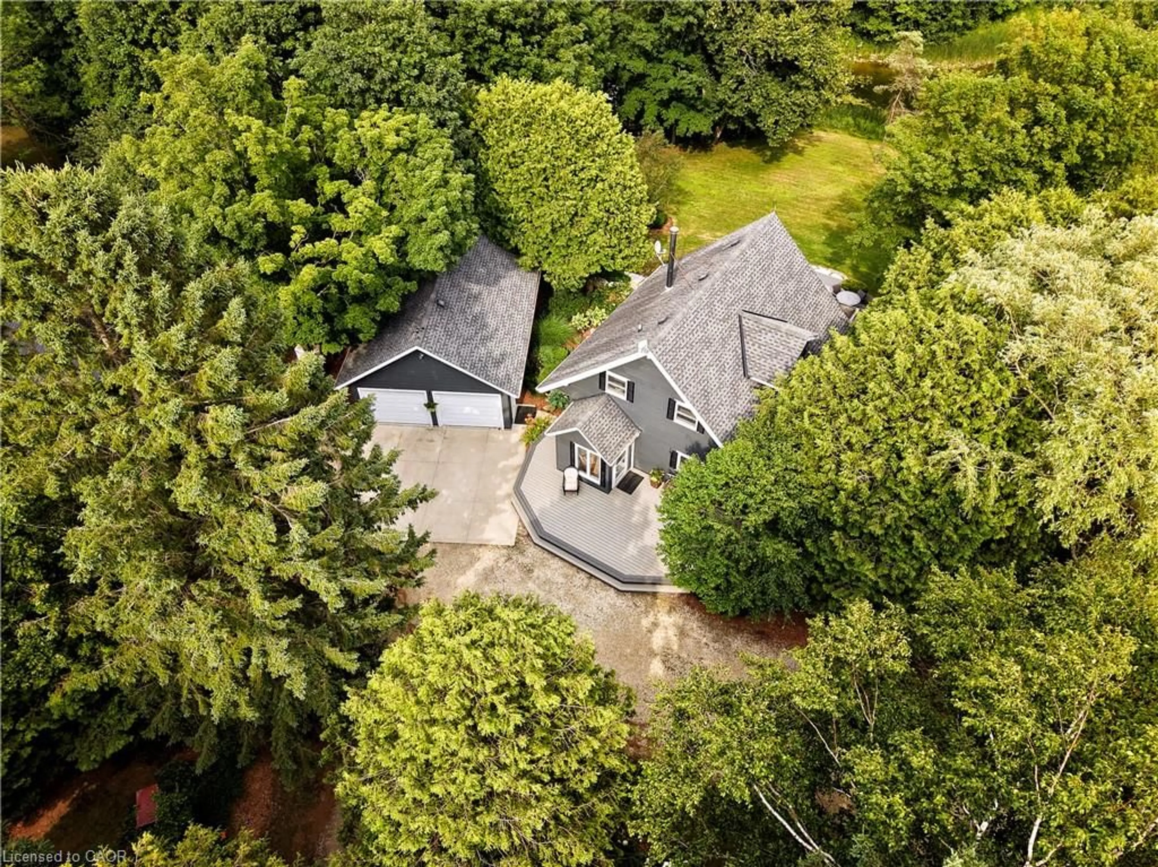 A pic from outside/outdoor area/front of a property/back of a property/a pic from drone, forest/trees view for 123083 Southgate Rd 12, Wellington North Ontario N0G 2L0