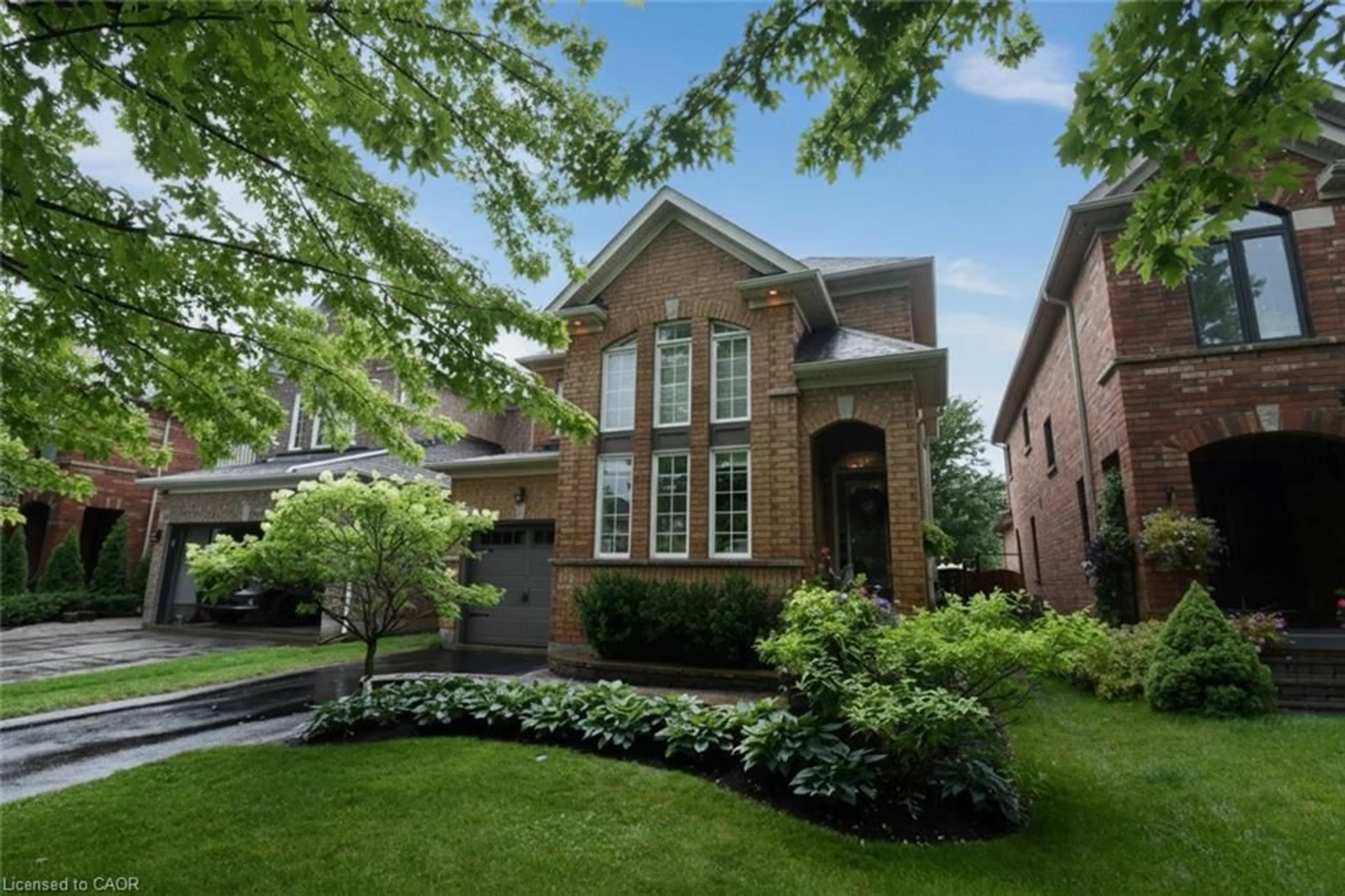 Home with brick exterior material, street for 16 Woodcote Cres, Georgetown Ontario L7G 6M2