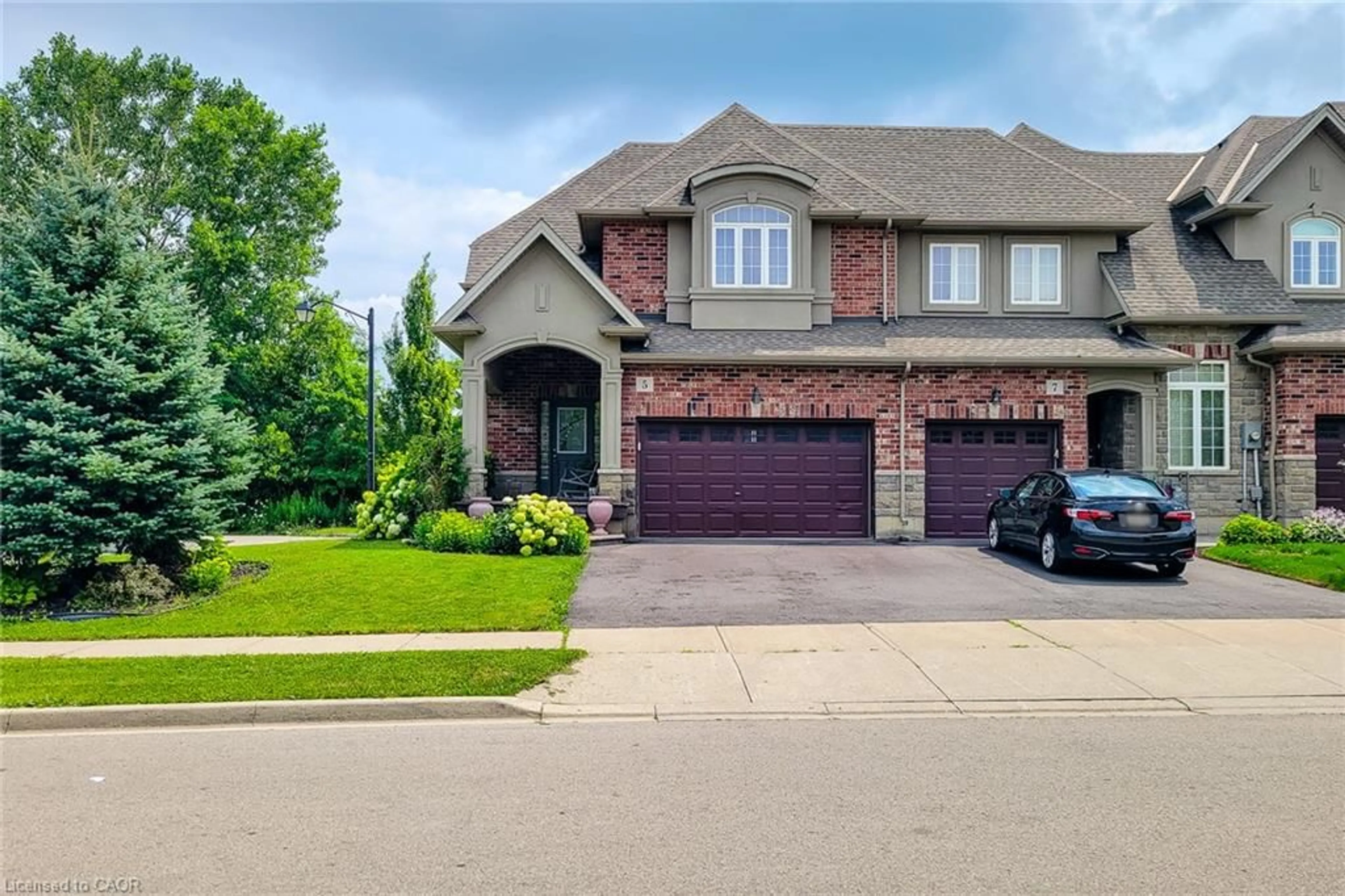 Home with brick exterior material, street for 5 Medici Lane, Hamilton Ontario L9B 0C8
