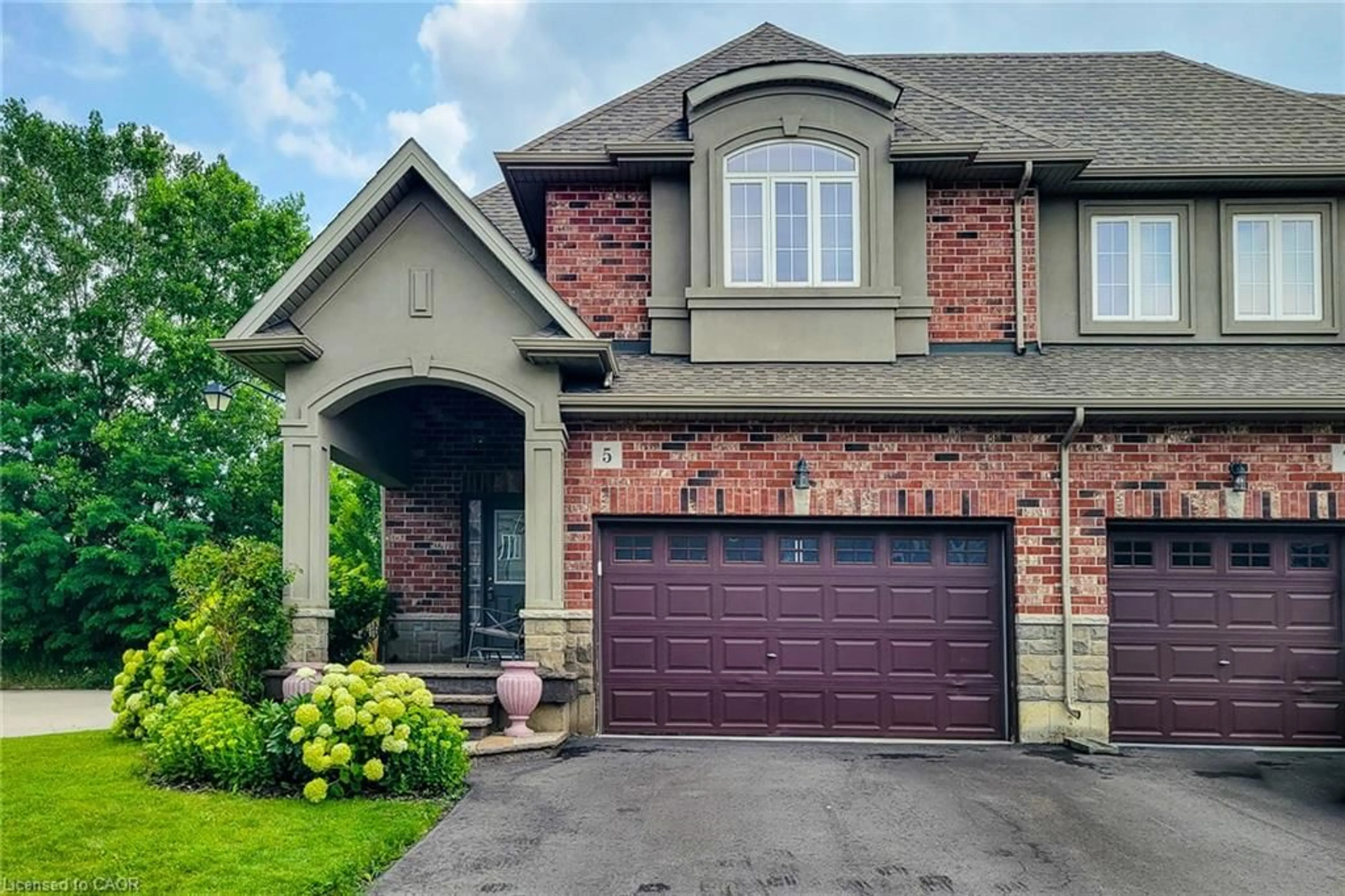 Home with brick exterior material, street for 5 Medici Lane, Hamilton Ontario L9B 0C8