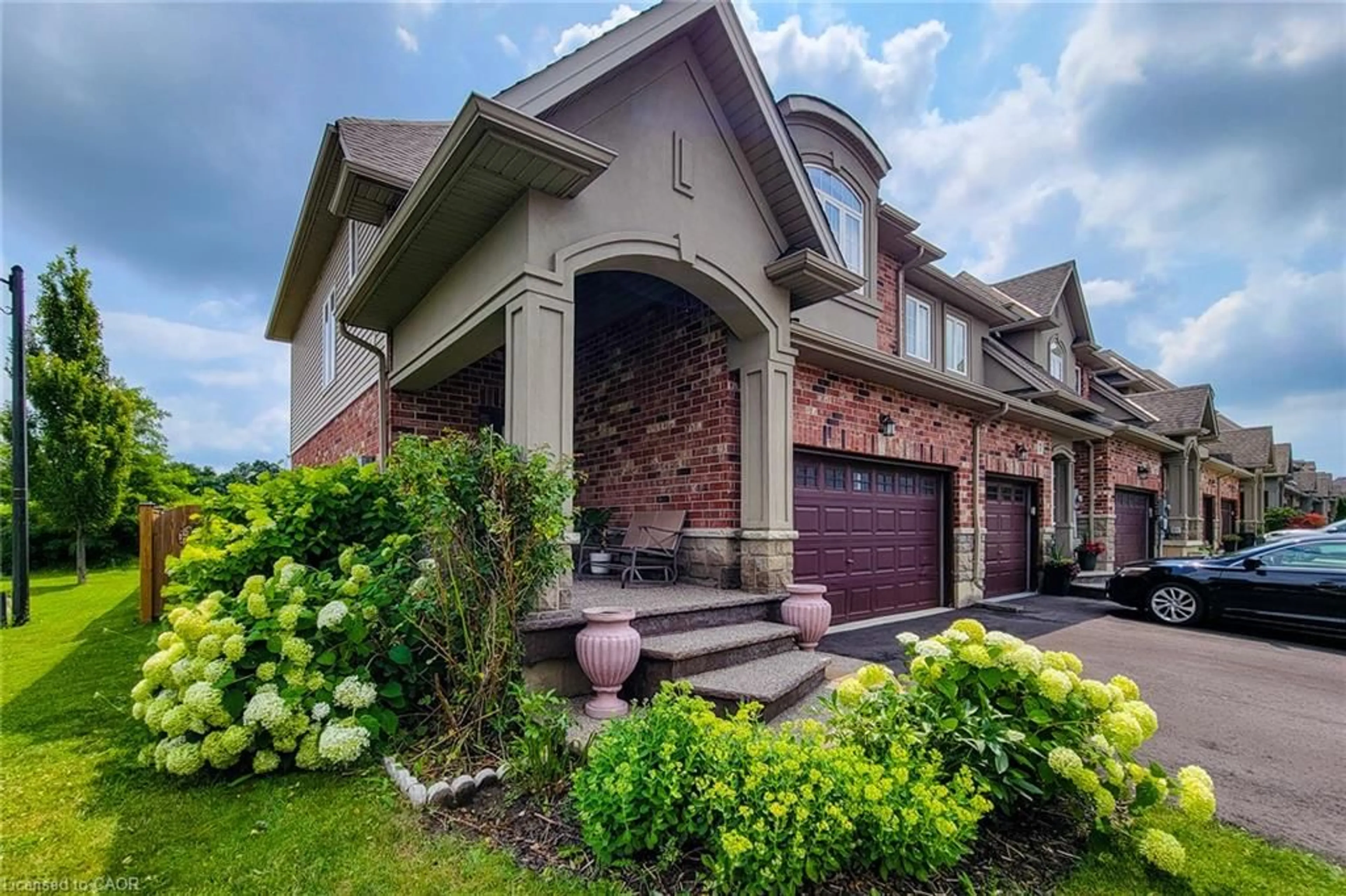 Home with brick exterior material, street for 5 Medici Lane, Hamilton Ontario L9B 0C8