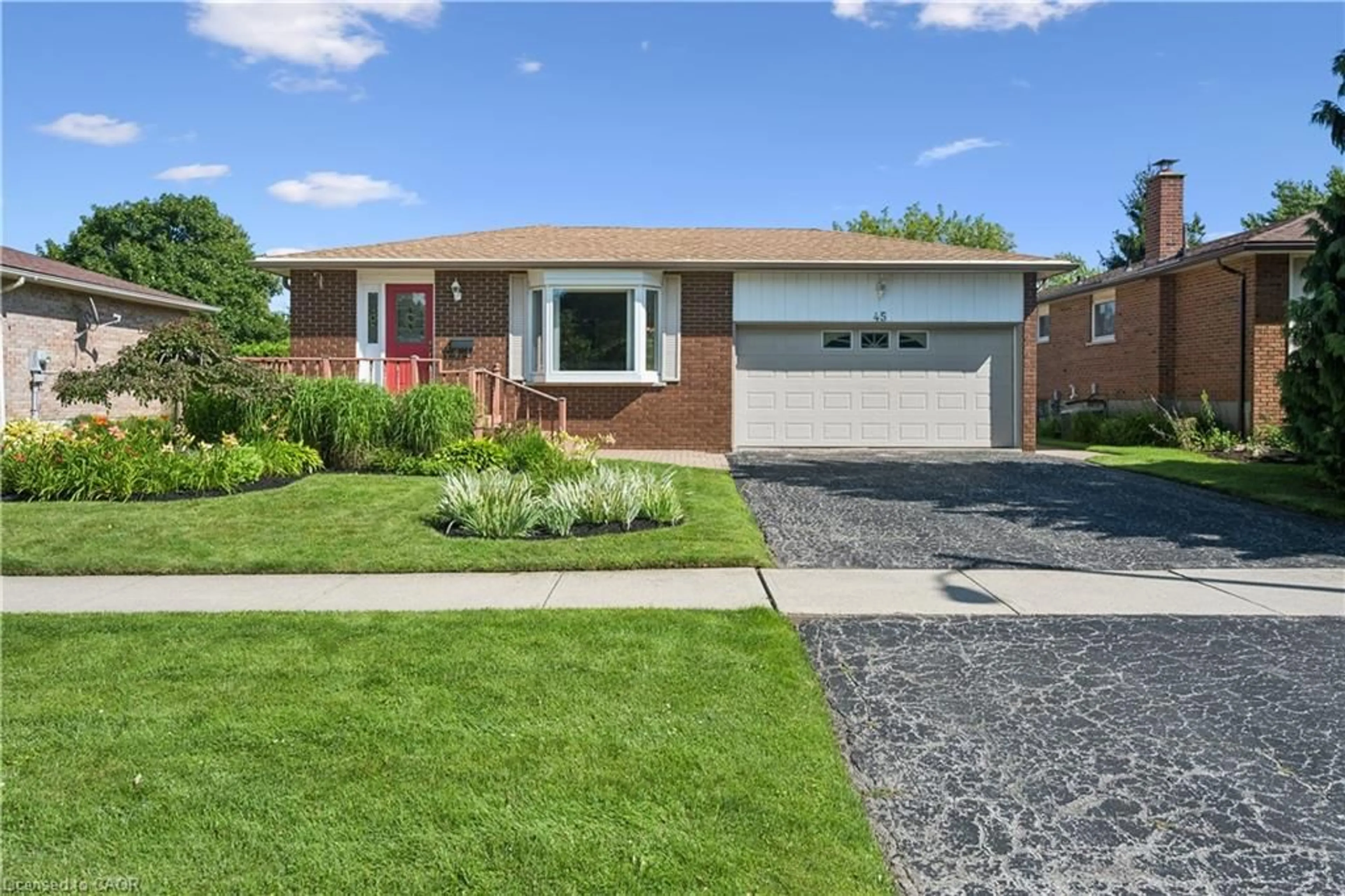 Home with brick exterior material, street for 45 Milverton Close, Waterdown Ontario L8B 0A9