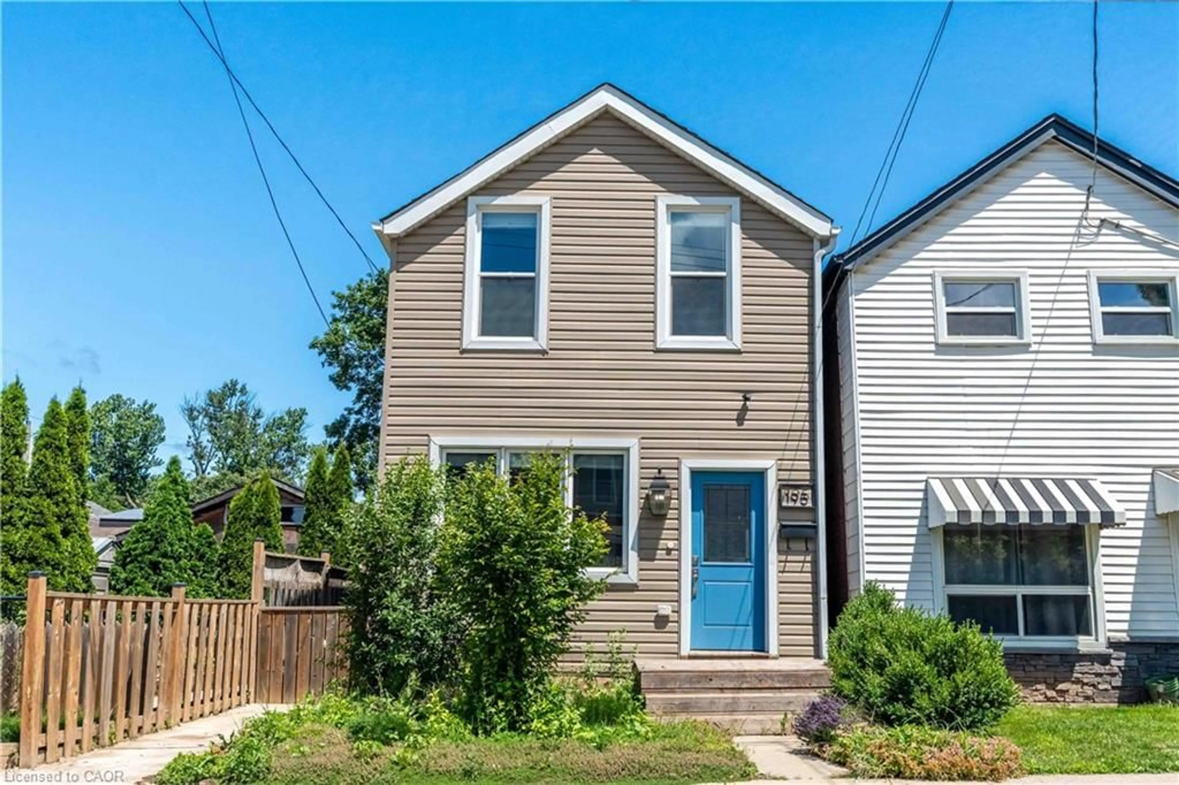 Home with vinyl exterior material, street for 195 Wood St, Hamilton Ontario L8L 3Z2