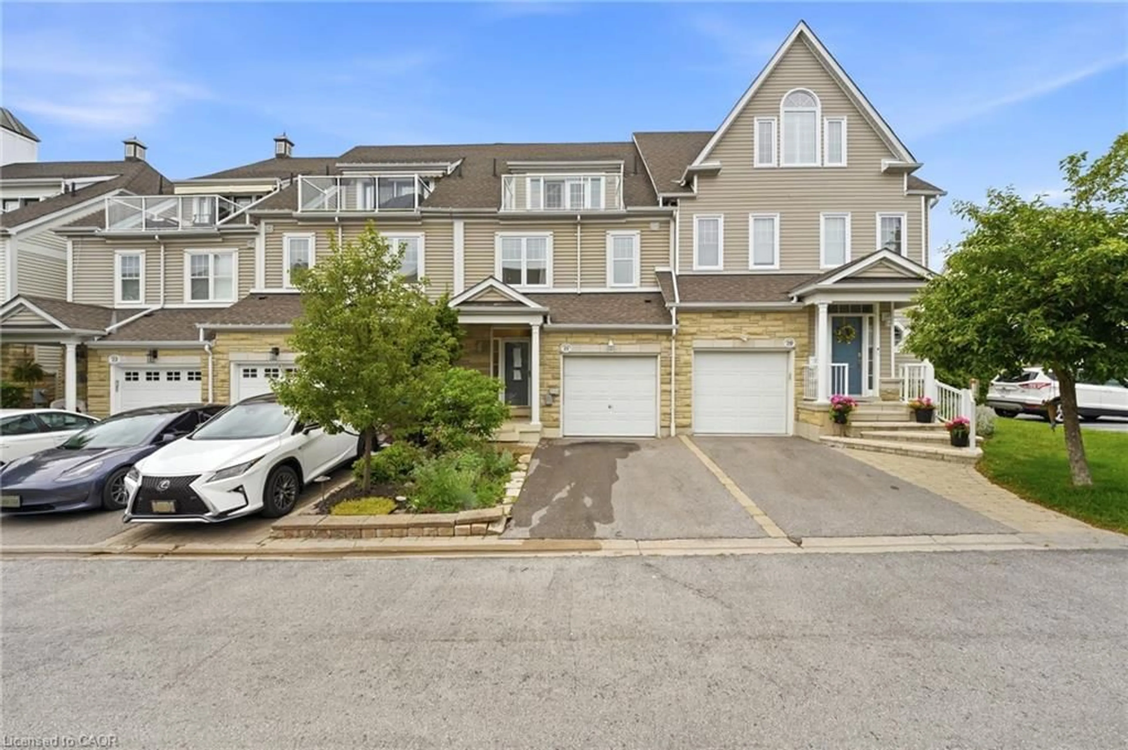 A pic from outside/outdoor area/front of a property/back of a property/a pic from drone, street for 1295 Wharf St #21, Pickering Ontario L1W 1A2