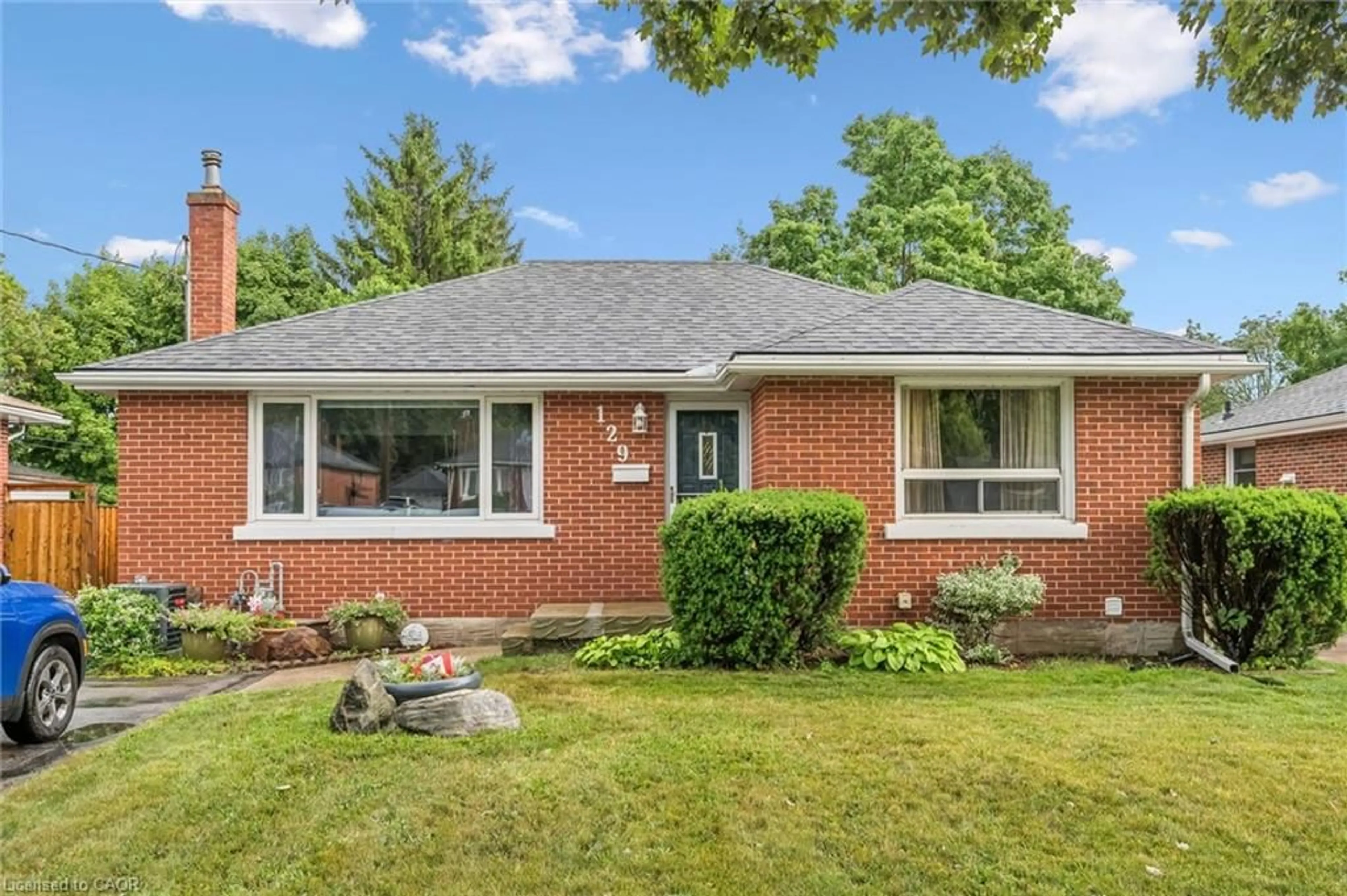 Home with brick exterior material, street for 129 Stewart Ave, Cambridge Ontario N1R 2V5