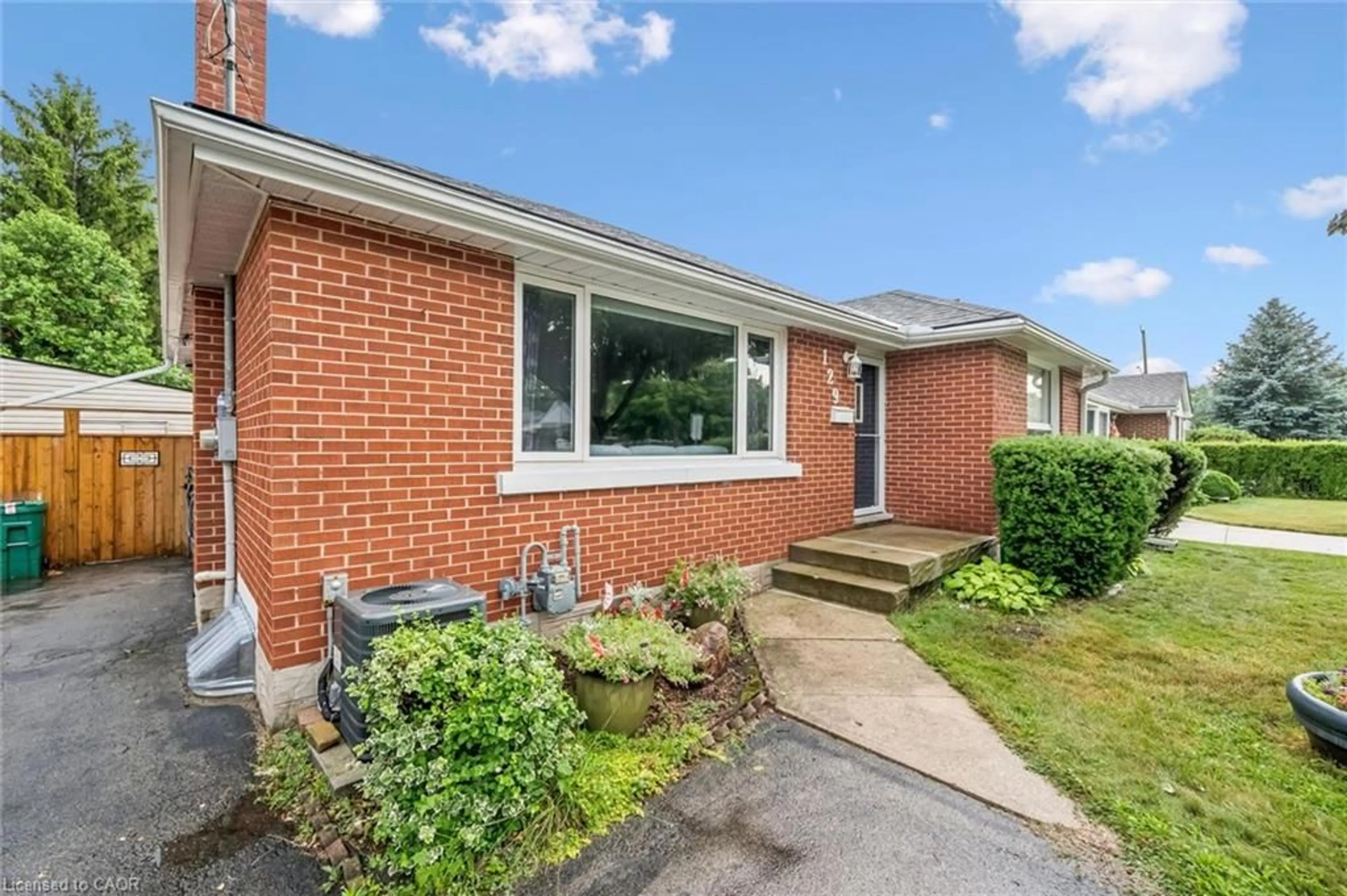 Home with brick exterior material, street for 129 Stewart Ave, Cambridge Ontario N1R 2V5
