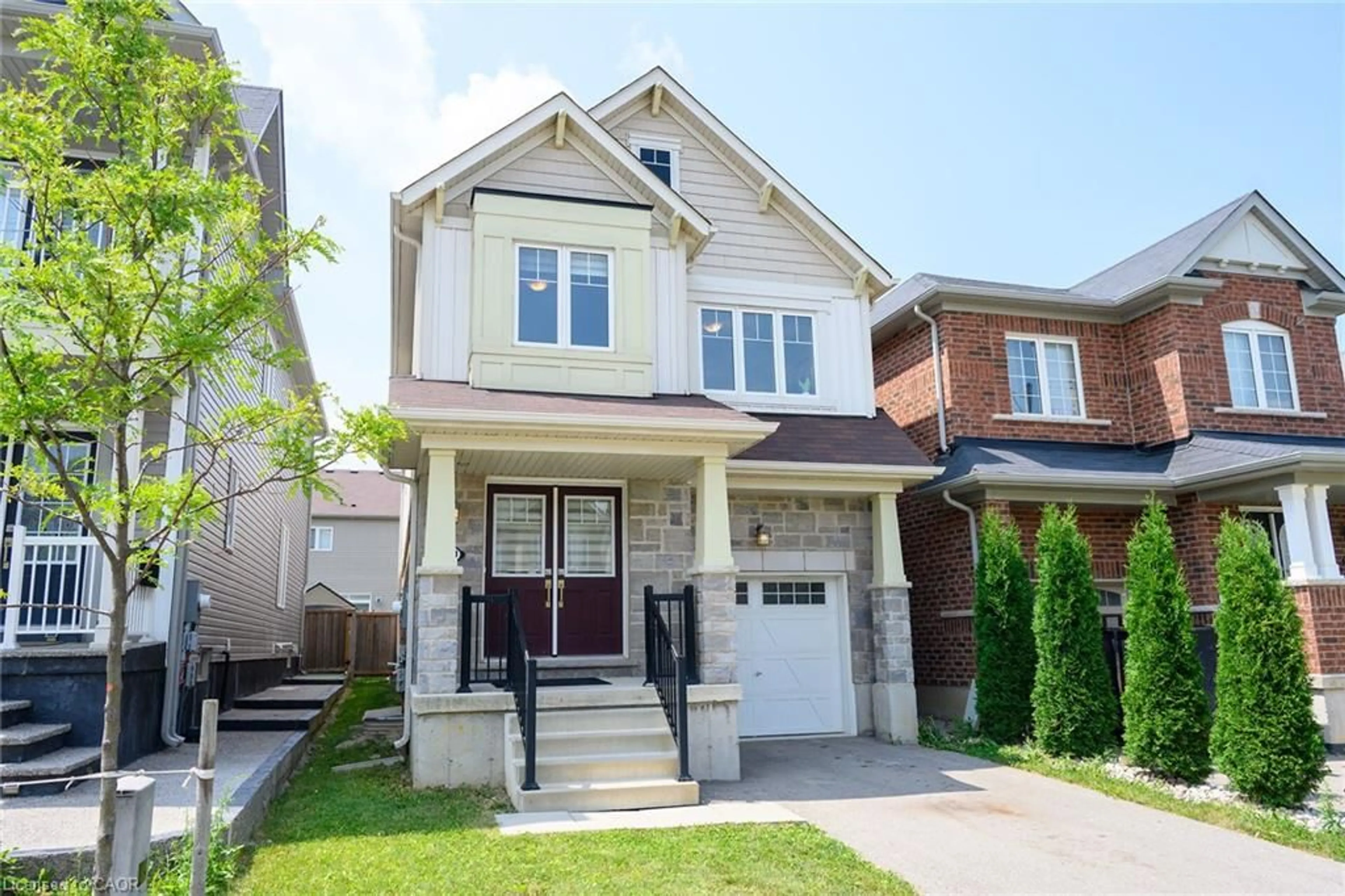 Home with brick exterior material, street for 31 Mccargow Dr, Caledonia Ontario N3W 0C3