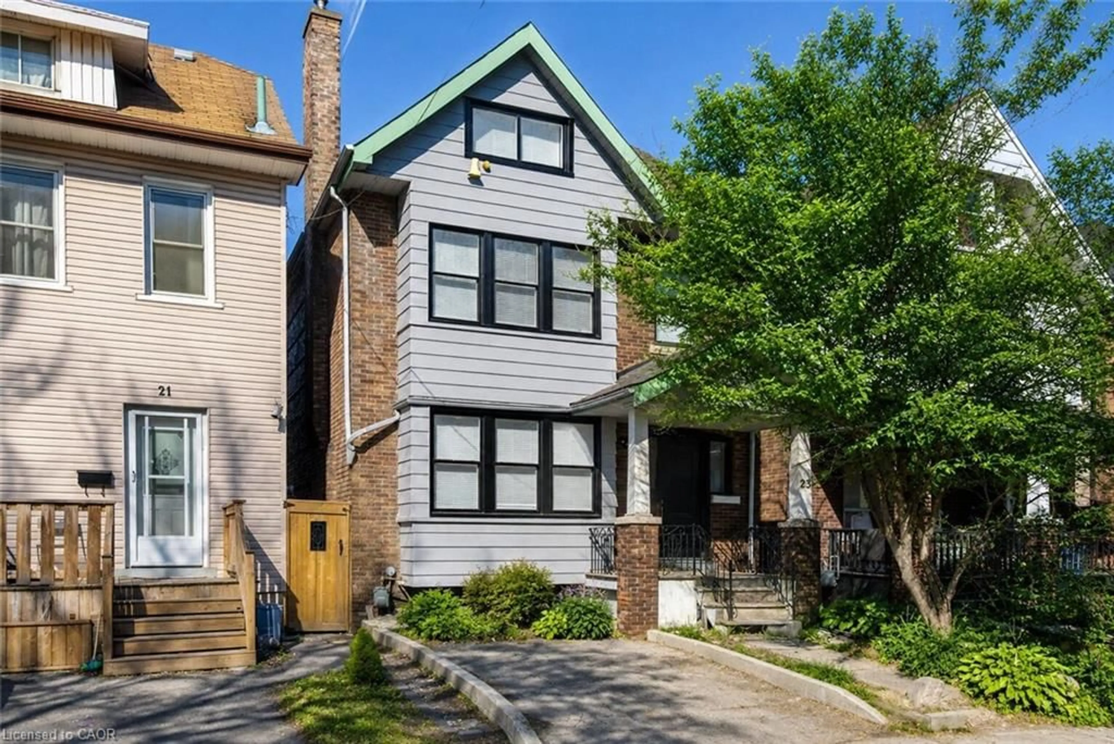 Home with brick exterior material, street for 23 Gibson Ave, Hamilton Ontario L8L 6J4