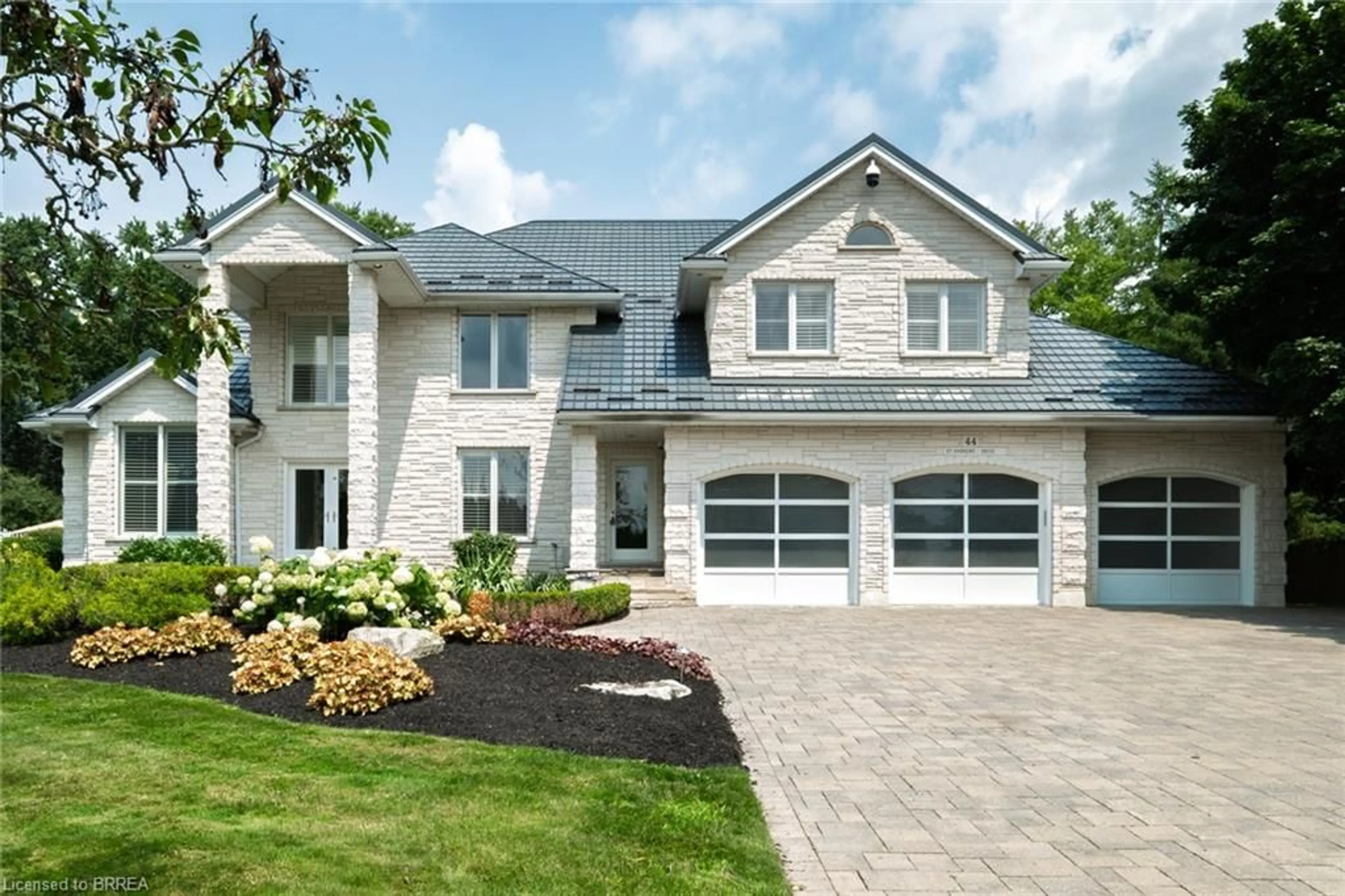 Home with brick exterior material, street for 44 St Andrew's Dr, Brantford Ontario N3T 6H3