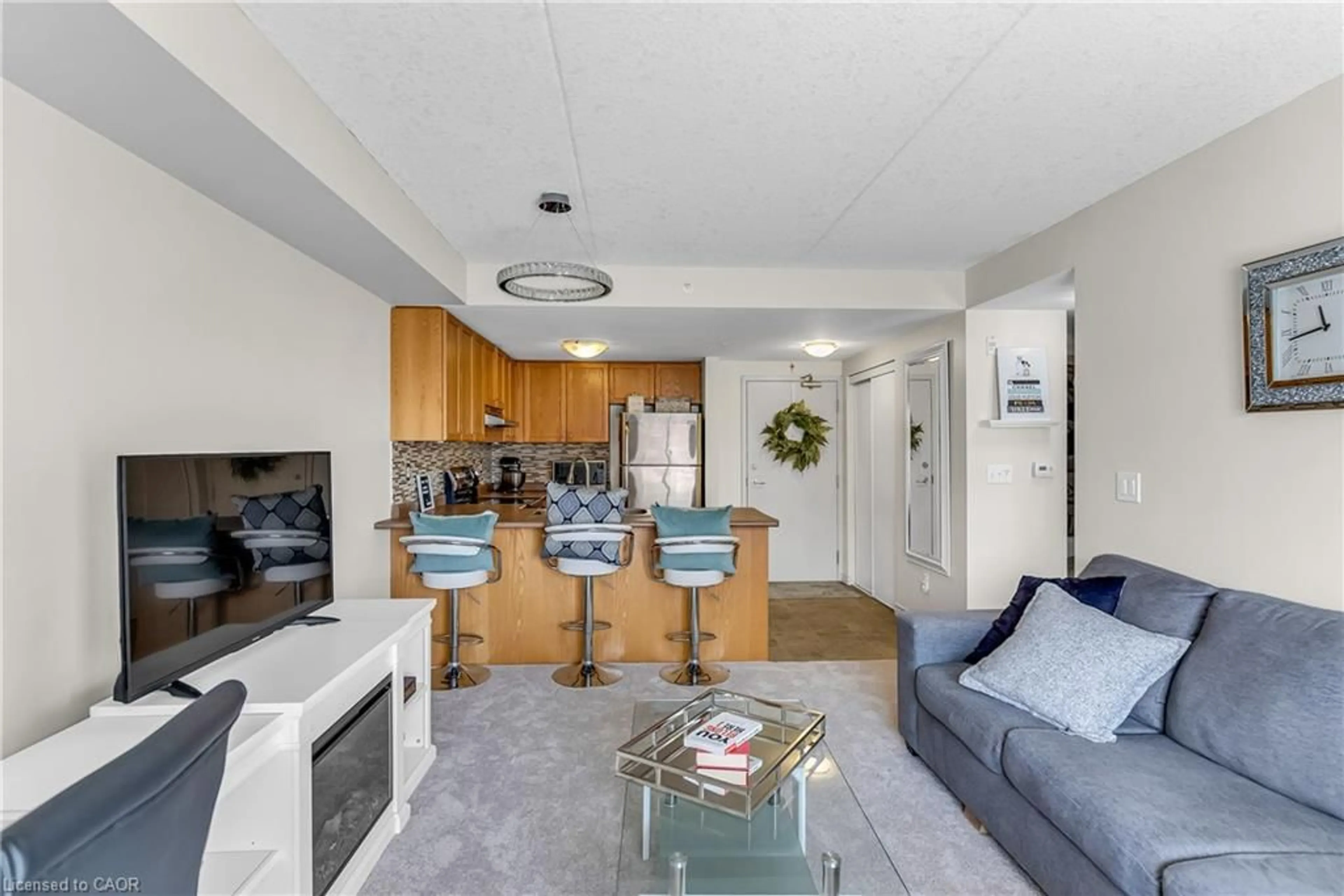 Living room with furniture, unknown for 39 Goodwin Dr #309, Guelph Ontario N1L 0E5