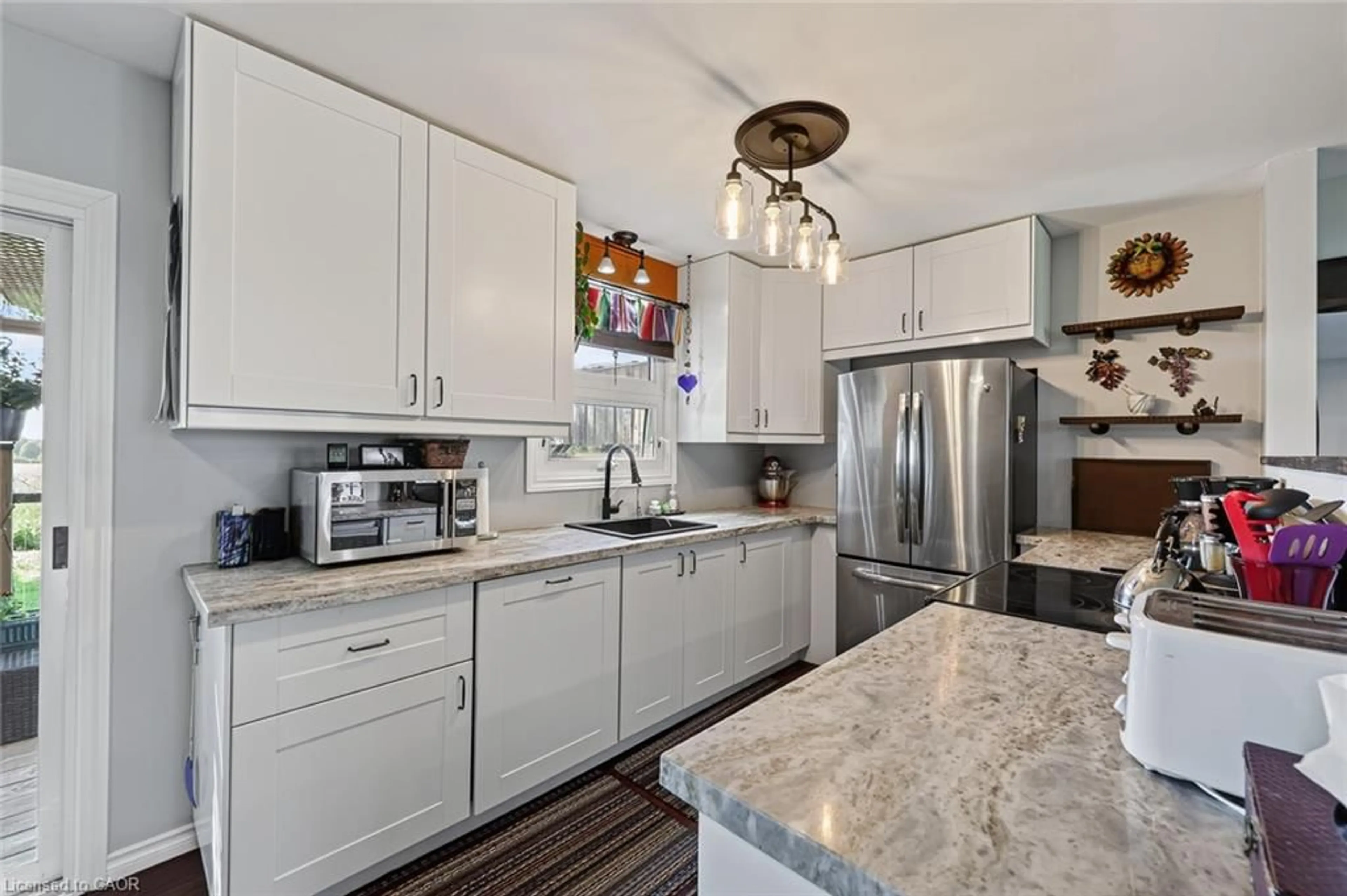 Open concept kitchen, ceramic/tile floor for 184726 Cornell Rd, Tillsonburg Ontario N4G 4G8
