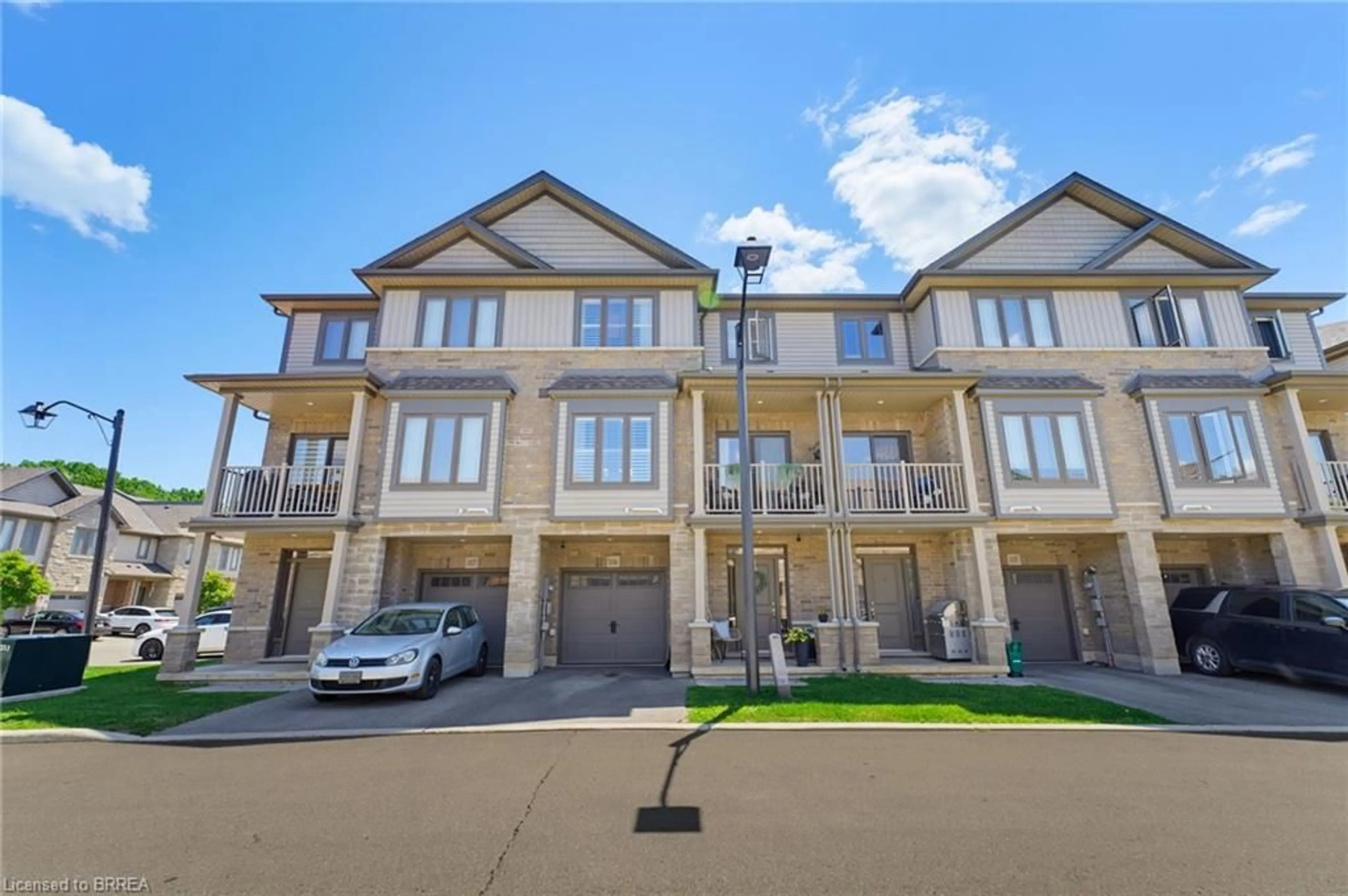 A pic from outside/outdoor area/front of a property/back of a property/a pic from drone, street for 77 Diana Ave #106, Brantford Ontario N3T 0R6
