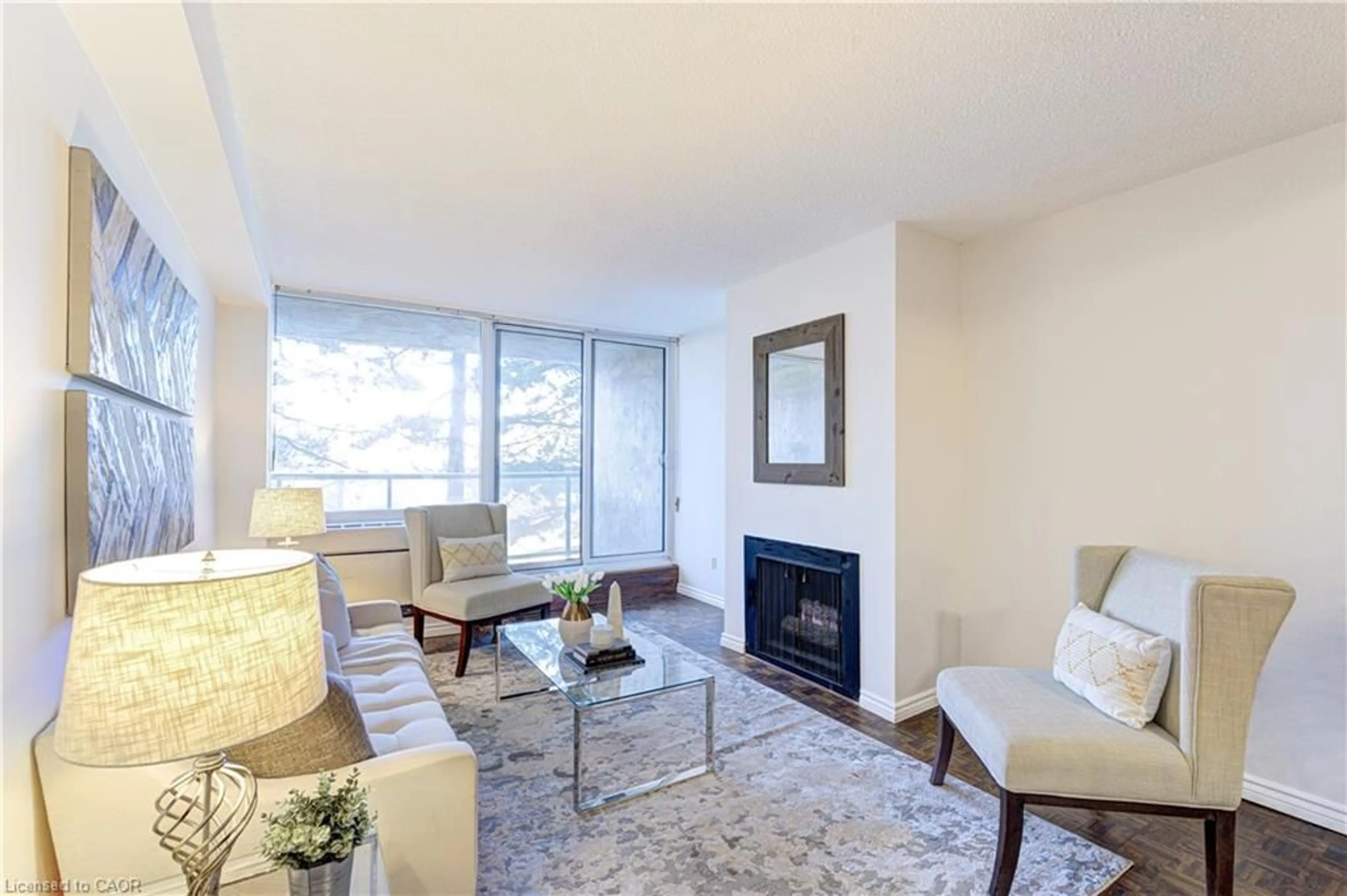 Living room with furniture, unknown for 20 Speers Rd #304, Oakville Ontario L6K 3R5