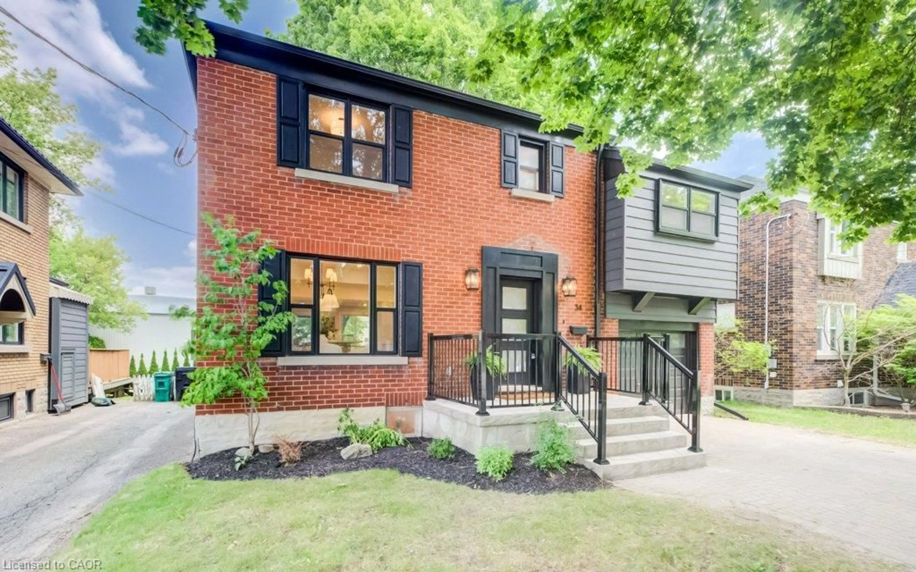 Home with brick exterior material, street for 34 Moore Ave, Waterloo Ontario N2J 3E5