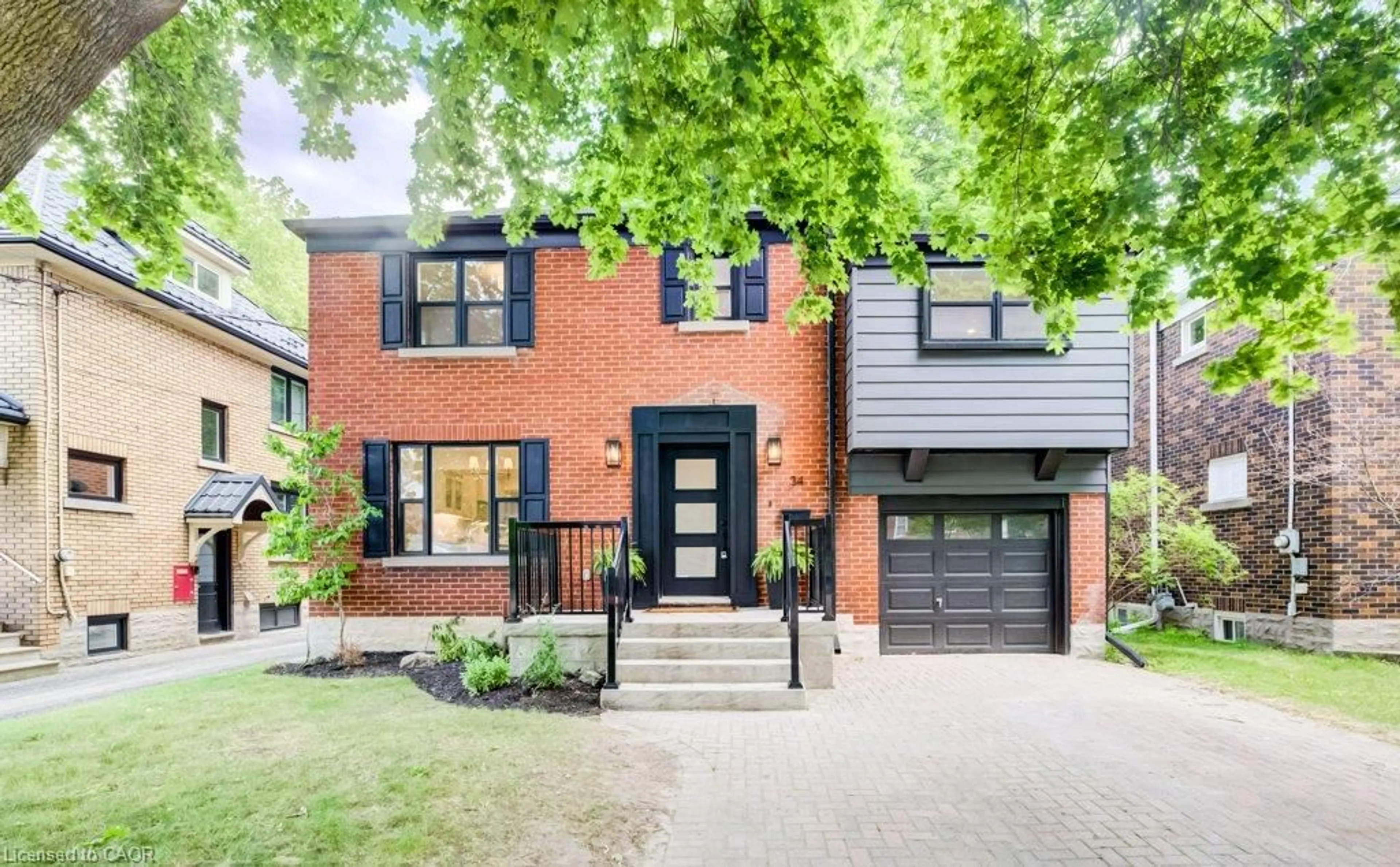 Home with brick exterior material, street for 34 Moore Ave, Waterloo Ontario N2J 3E5