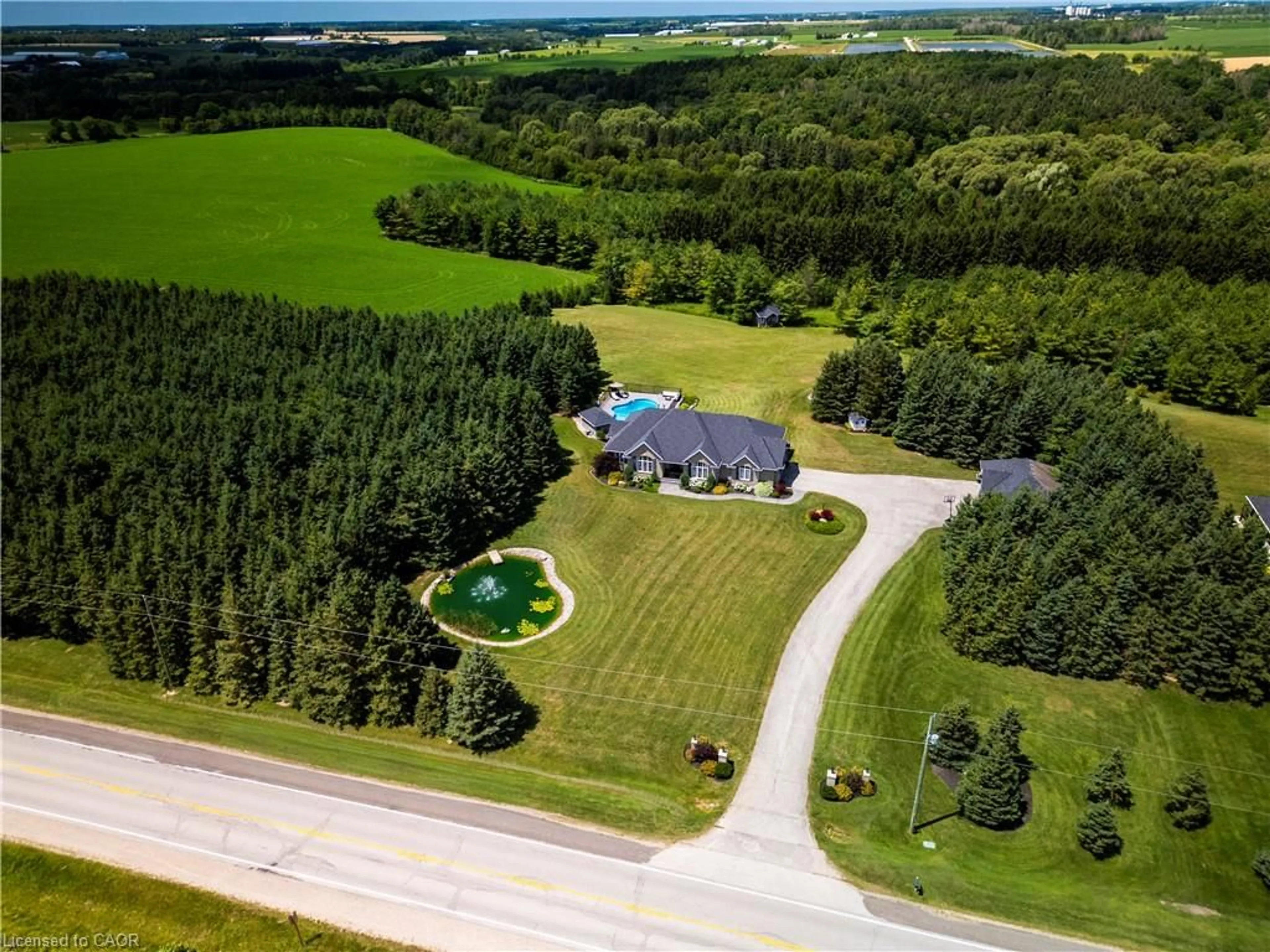 A pic from outside/outdoor area/front of a property/back of a property/a pic from drone, unknown for 7118 Wellington Rd 11 Rd, Drayton Ontario N0G 1P0