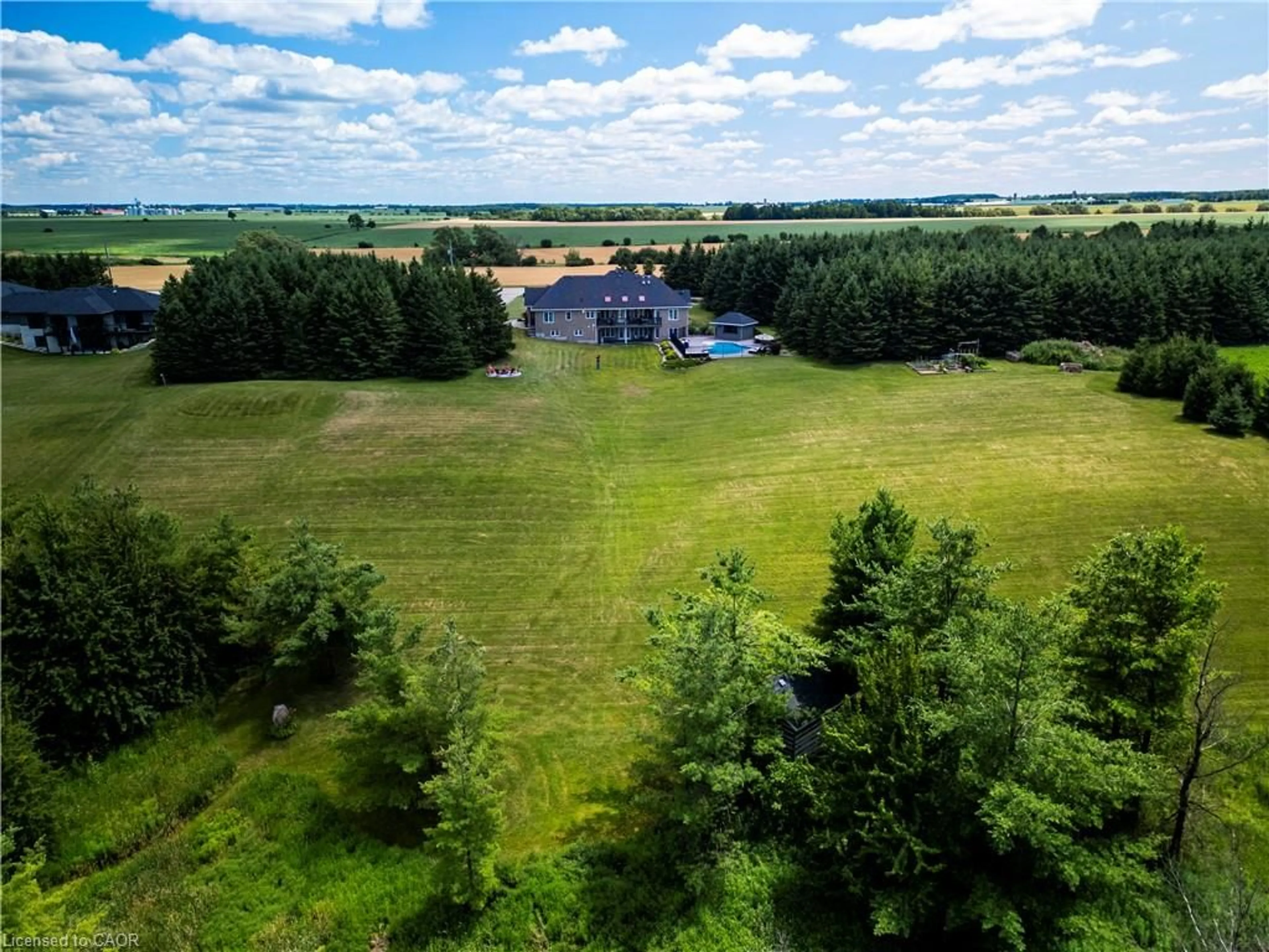 A pic from outside/outdoor area/front of a property/back of a property/a pic from drone, forest/trees view for 7118 Wellington Rd 11 Rd, Drayton Ontario N0G 1P0
