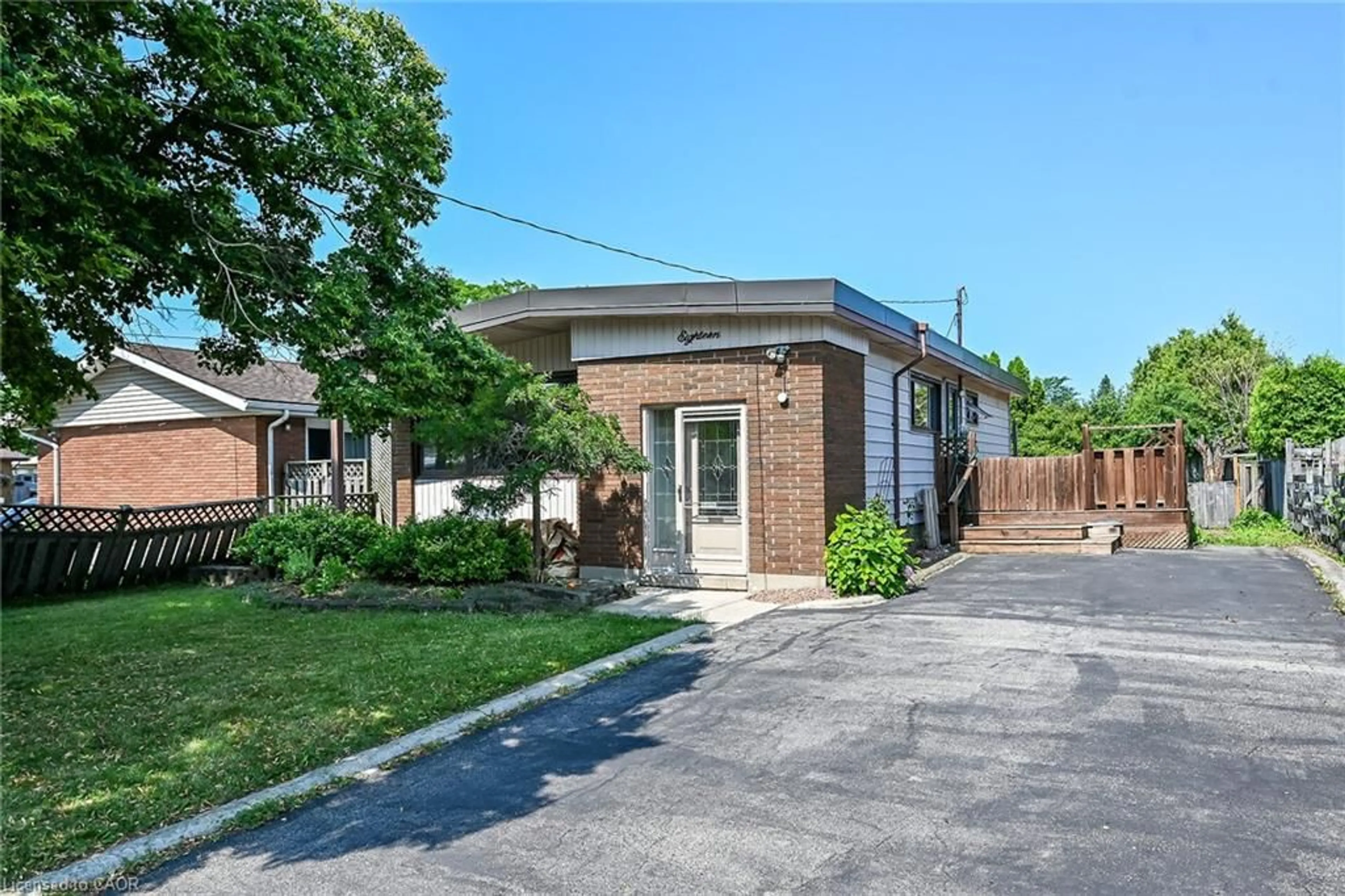 Home with brick exterior material, street for 18 Coral Dr, Hamilton Ontario L8V 2N5