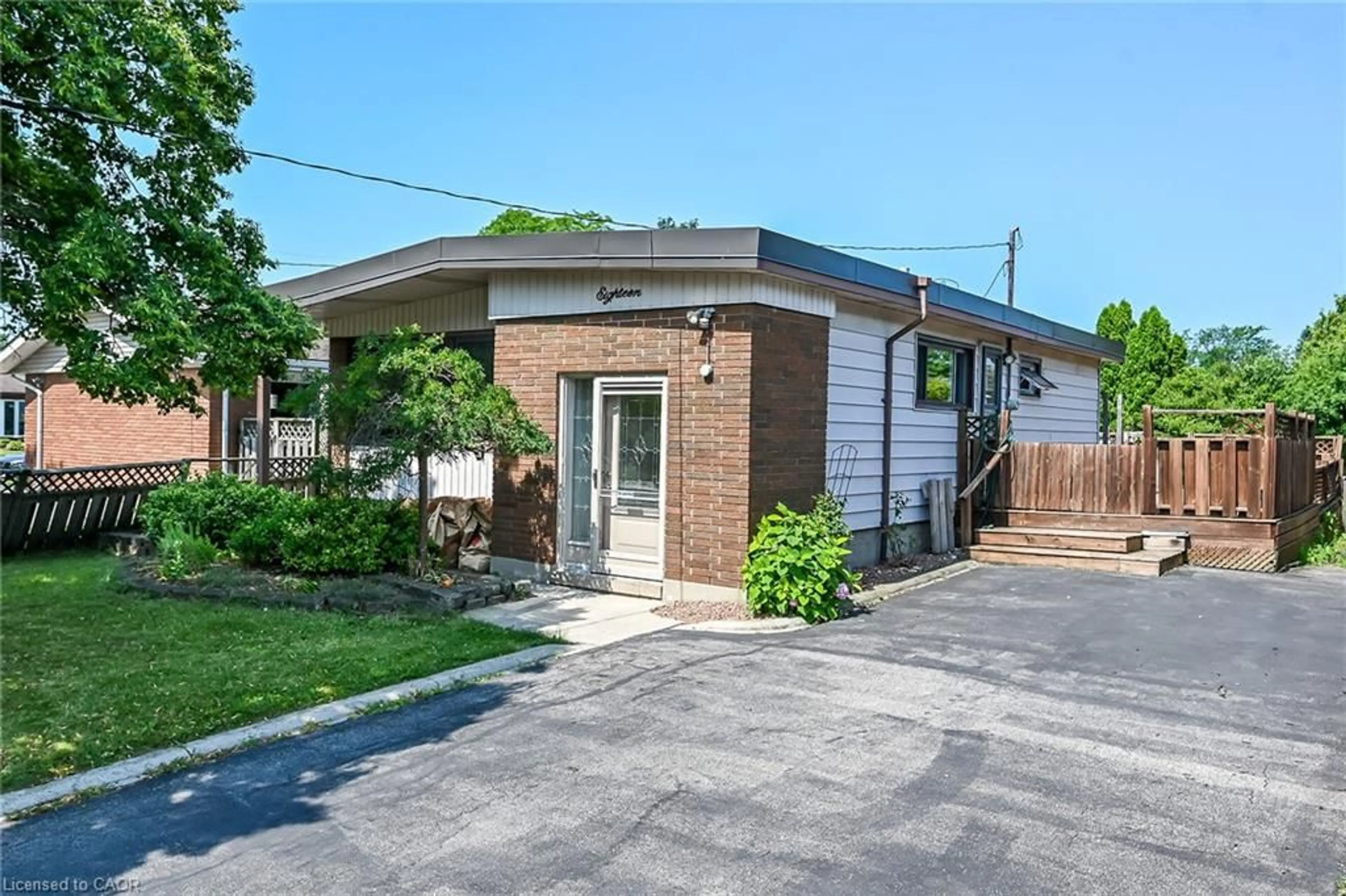 Home with brick exterior material, street for 18 Coral Dr, Hamilton Ontario L8V 2N5