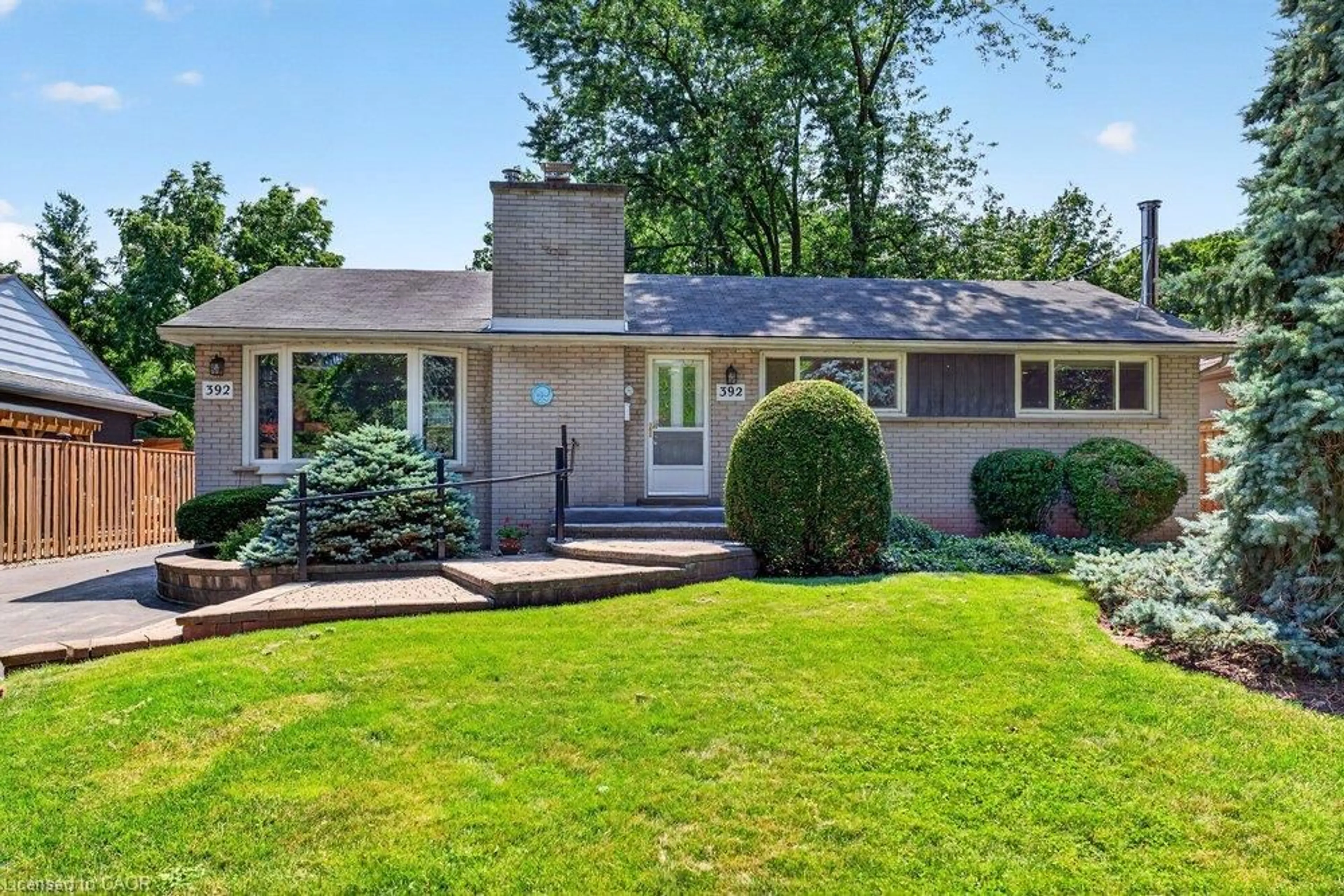 Home with brick exterior material, street for 392 Henderson Rd, Burlington Ontario L7L 2P8