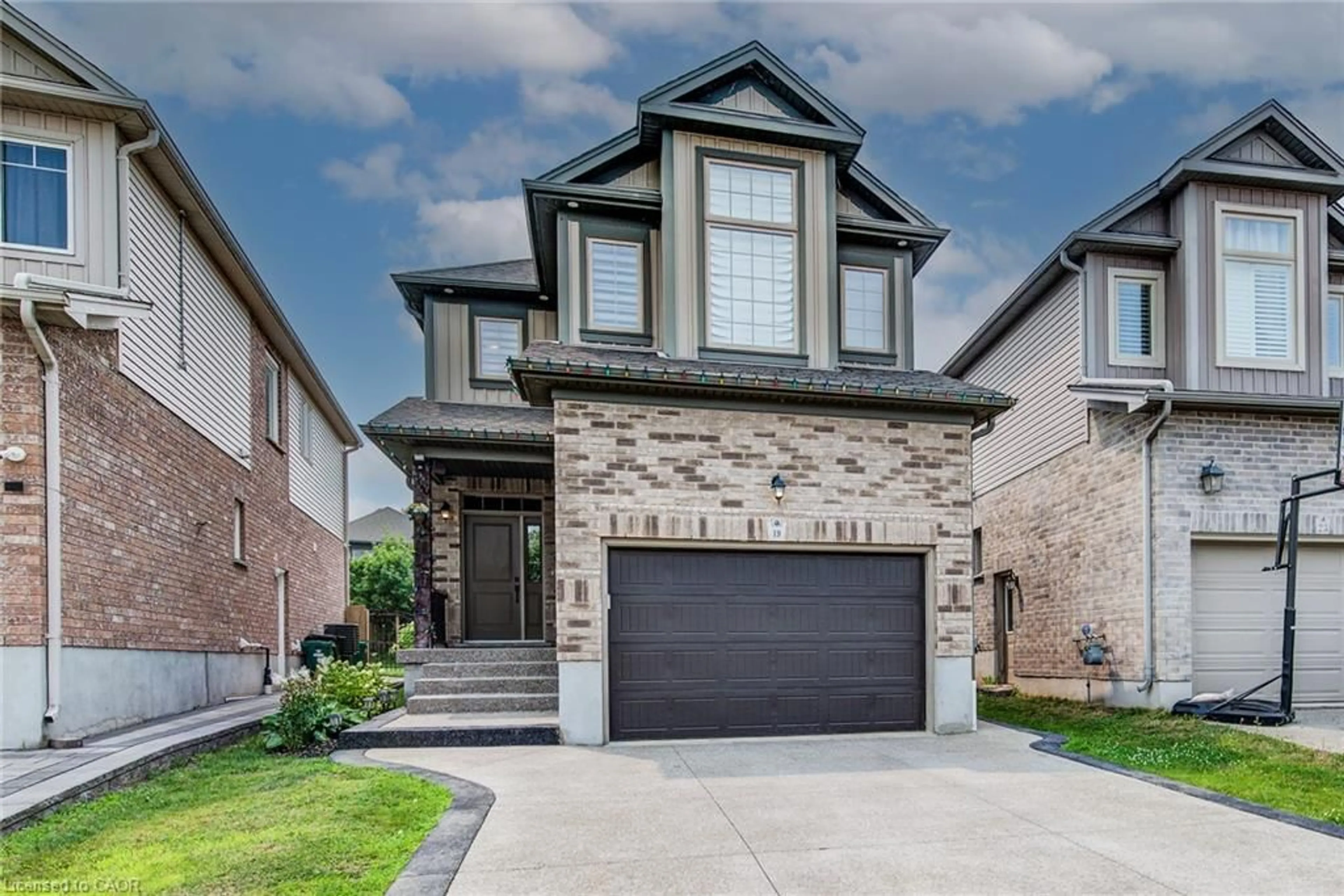 Home with brick exterior material, street for 19 Springcreek St, Kitchener Ontario N2A 0G3