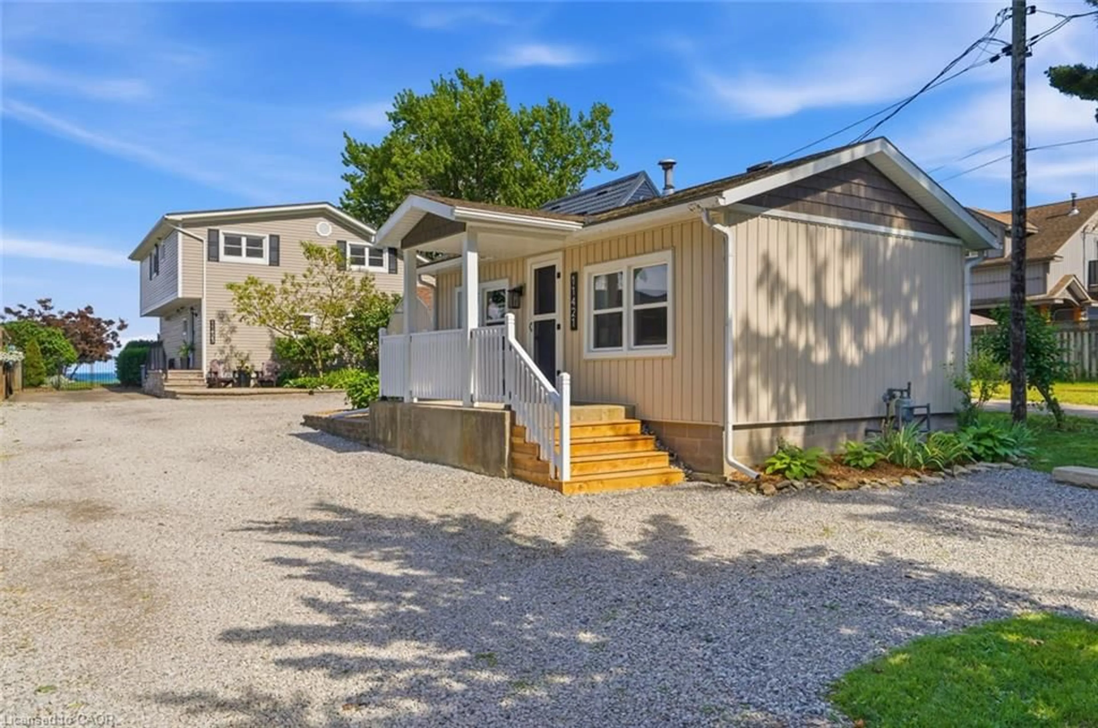 Home with vinyl exterior material, street for 11423 Morgans Point Rd, Port Colborne Ontario L3K 5V4