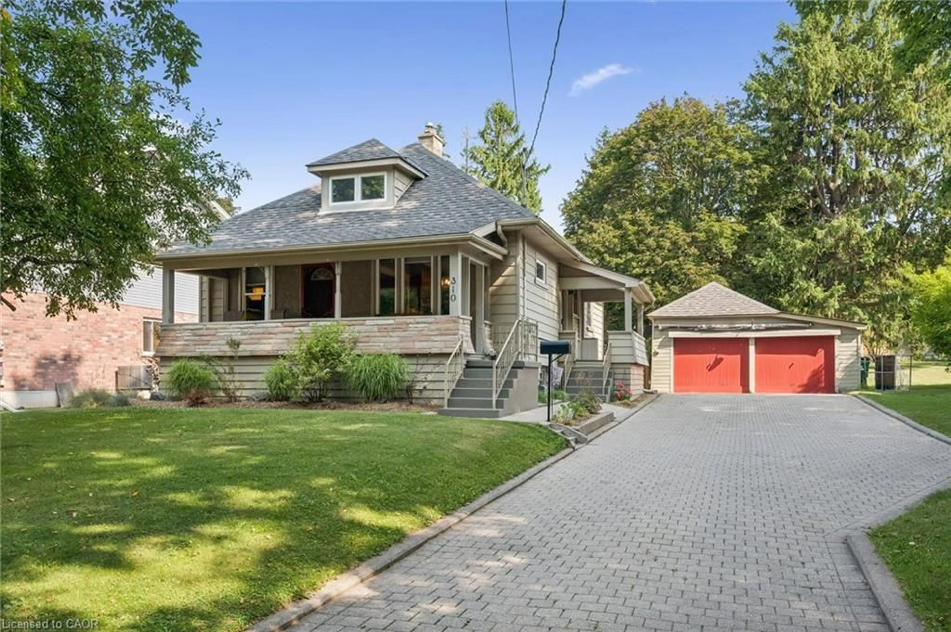 Home with brick exterior material, street for 310 Kitchener Rd, Cambridge Ontario N3H 1A6