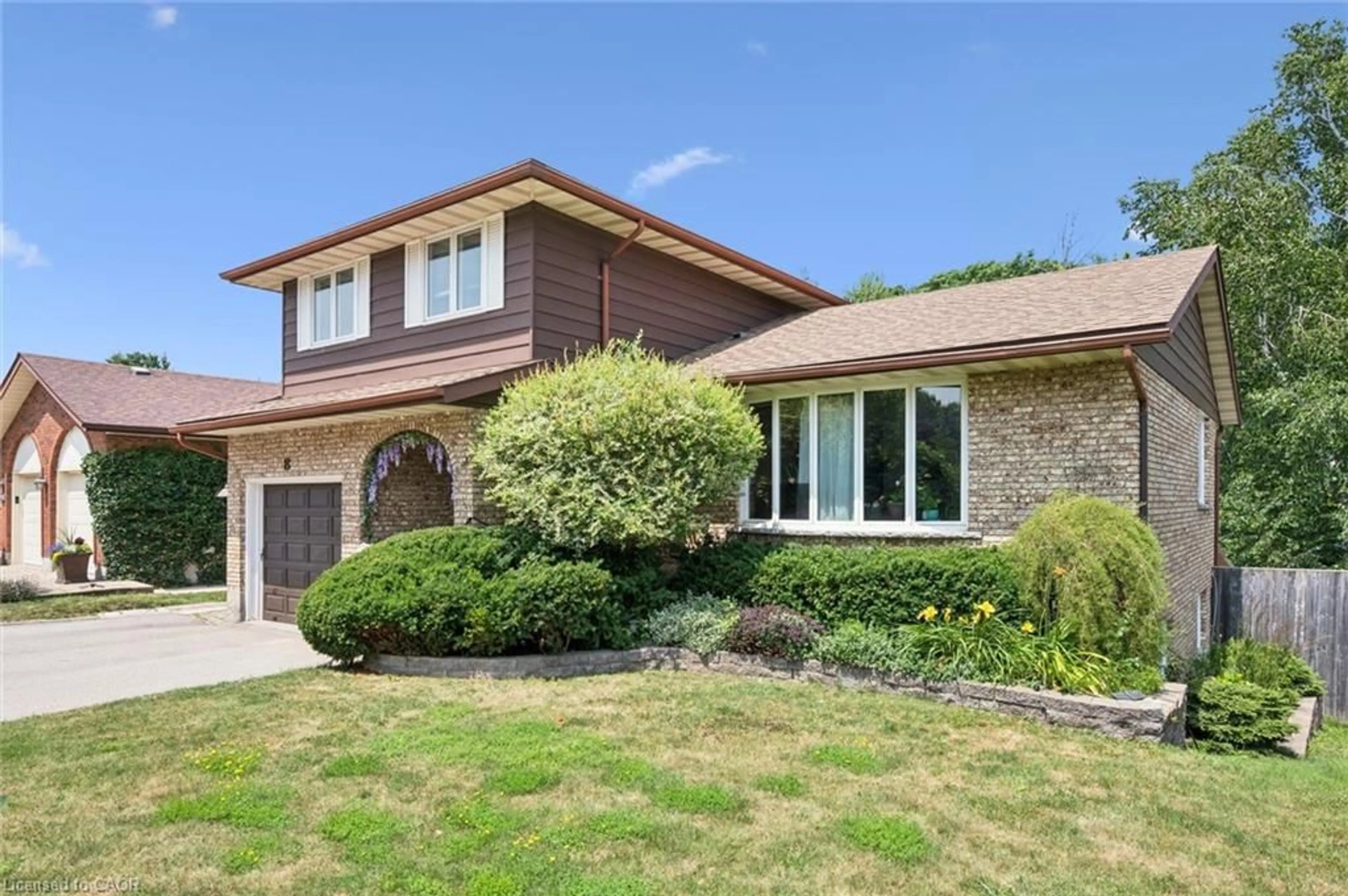 Home with brick exterior material, street for 8 Perin Pl, Kitchener Ontario N2P 1L5