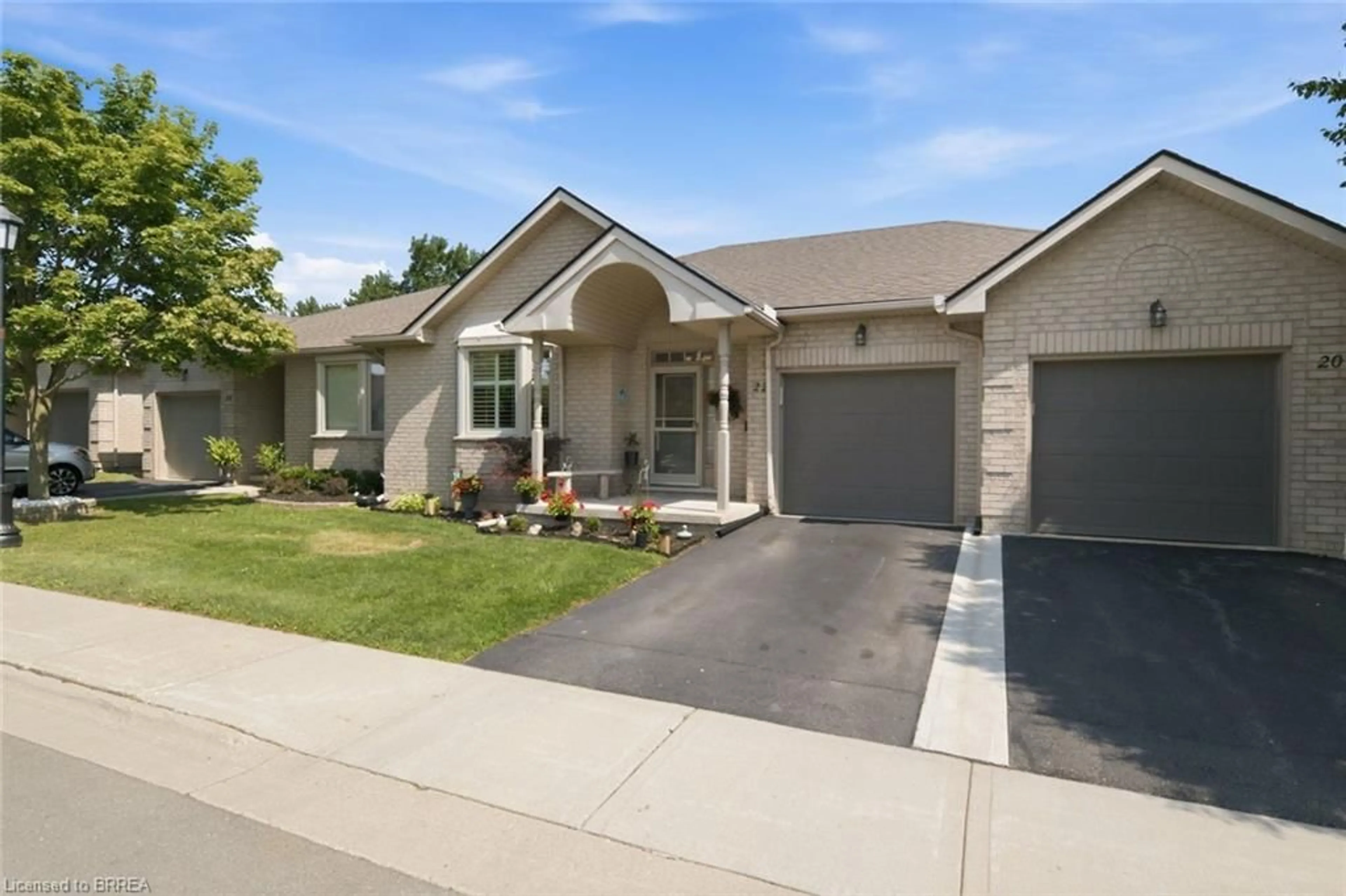 Home with brick exterior material, street for 22 Riveroaks Dr, Mount Hope Ontario L0R 1W0