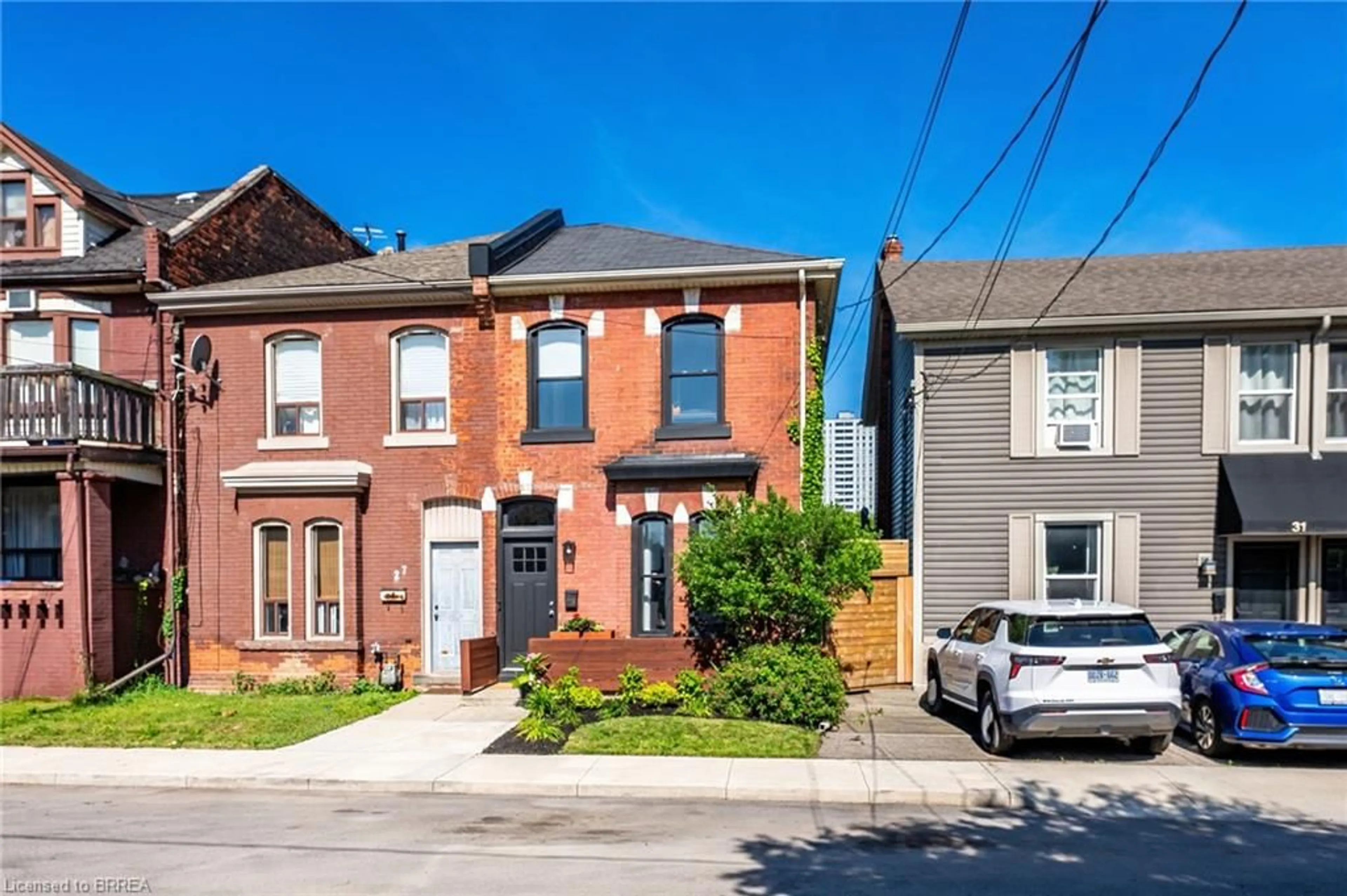 Home with brick exterior material, street for 29 Railway St, Hamilton Ontario L8R 2R4