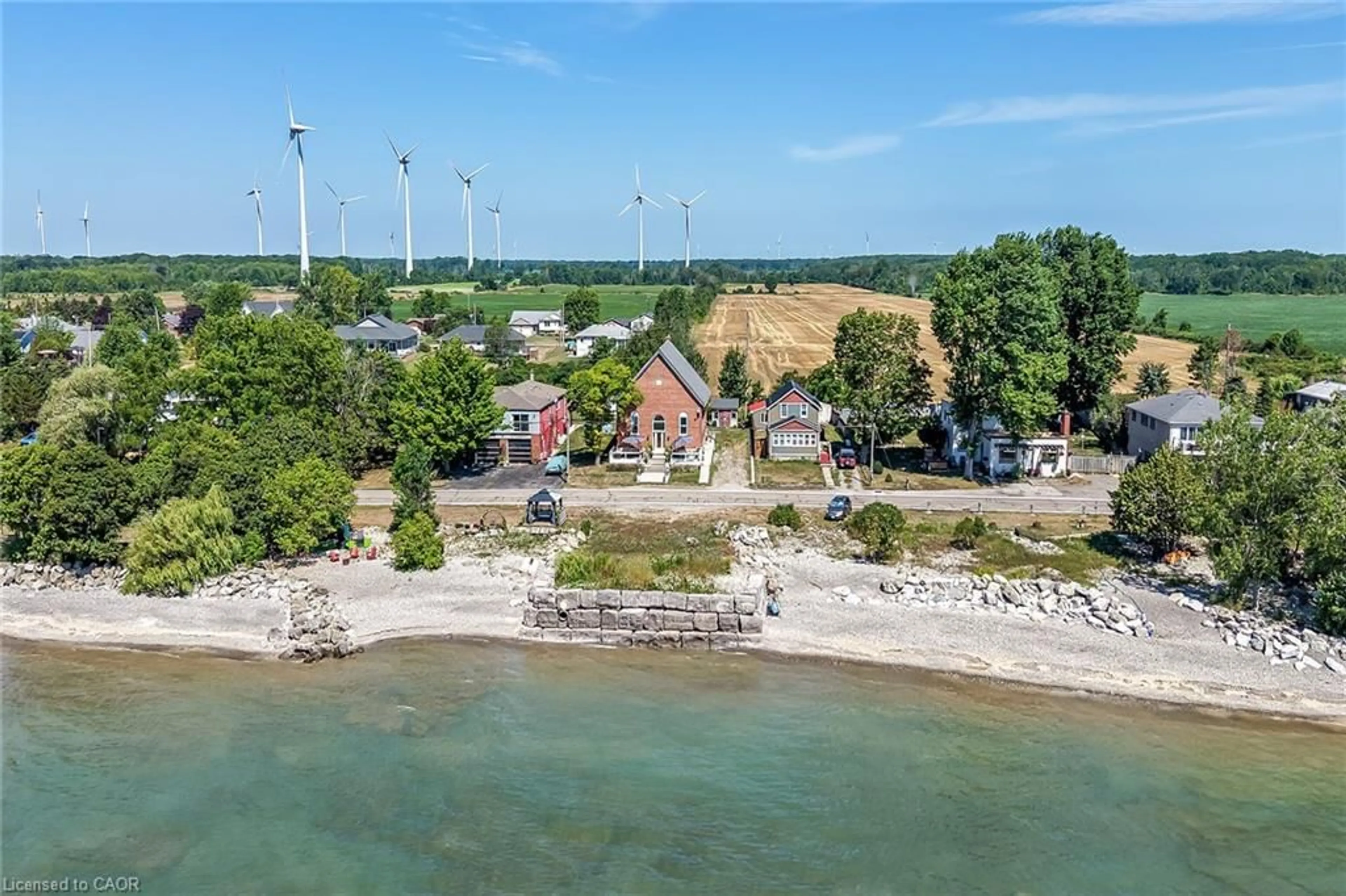 A pic from outside/outdoor area/front of a property/back of a property/a pic from drone, water/lake/river/ocean view for 2687 North Shore Dr, Lowbanks Ontario N0A 1K0