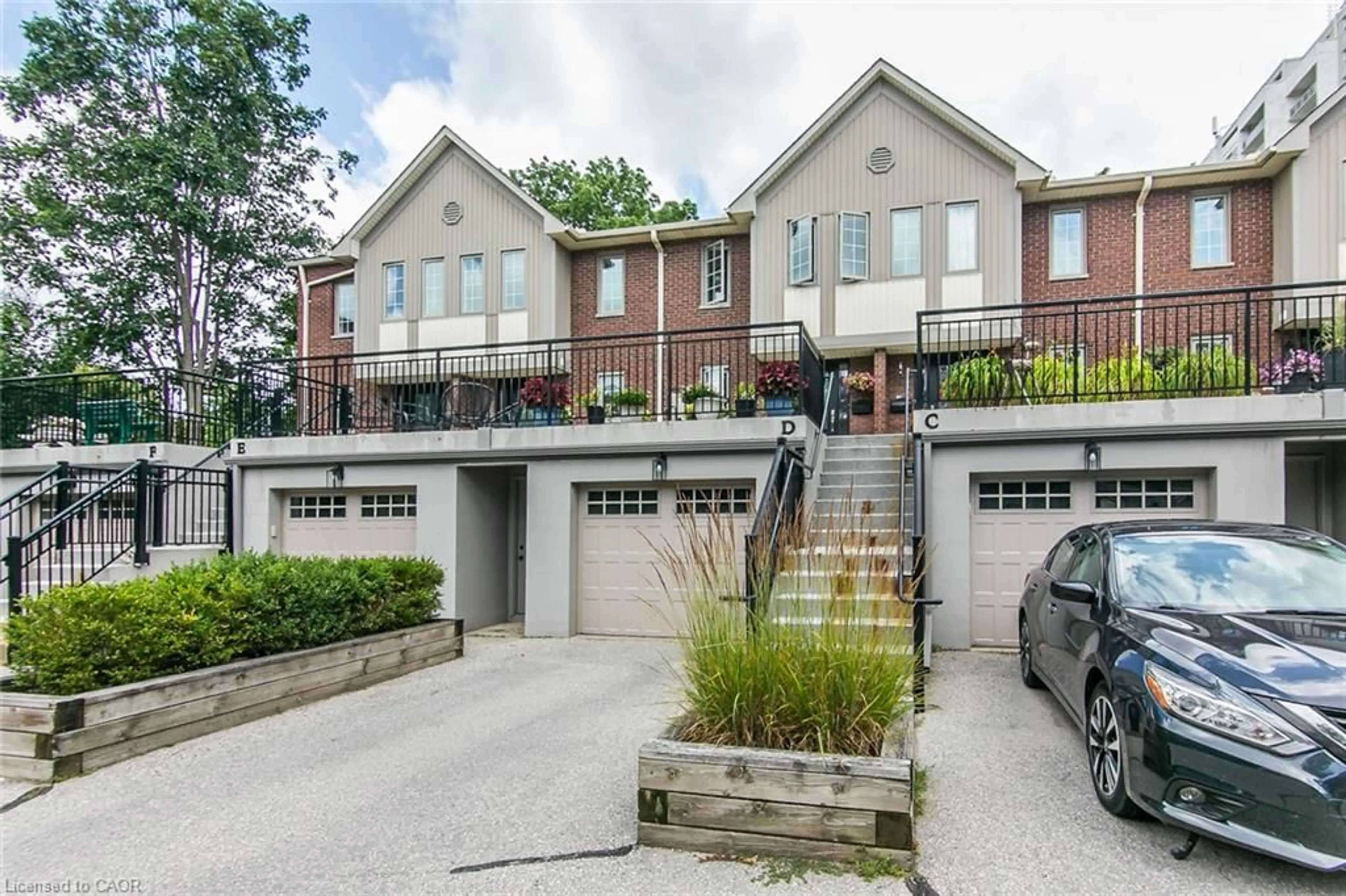 Home with brick exterior material, street for 28 Ahrens St #D, Kitchener Ontario N2H 4B7