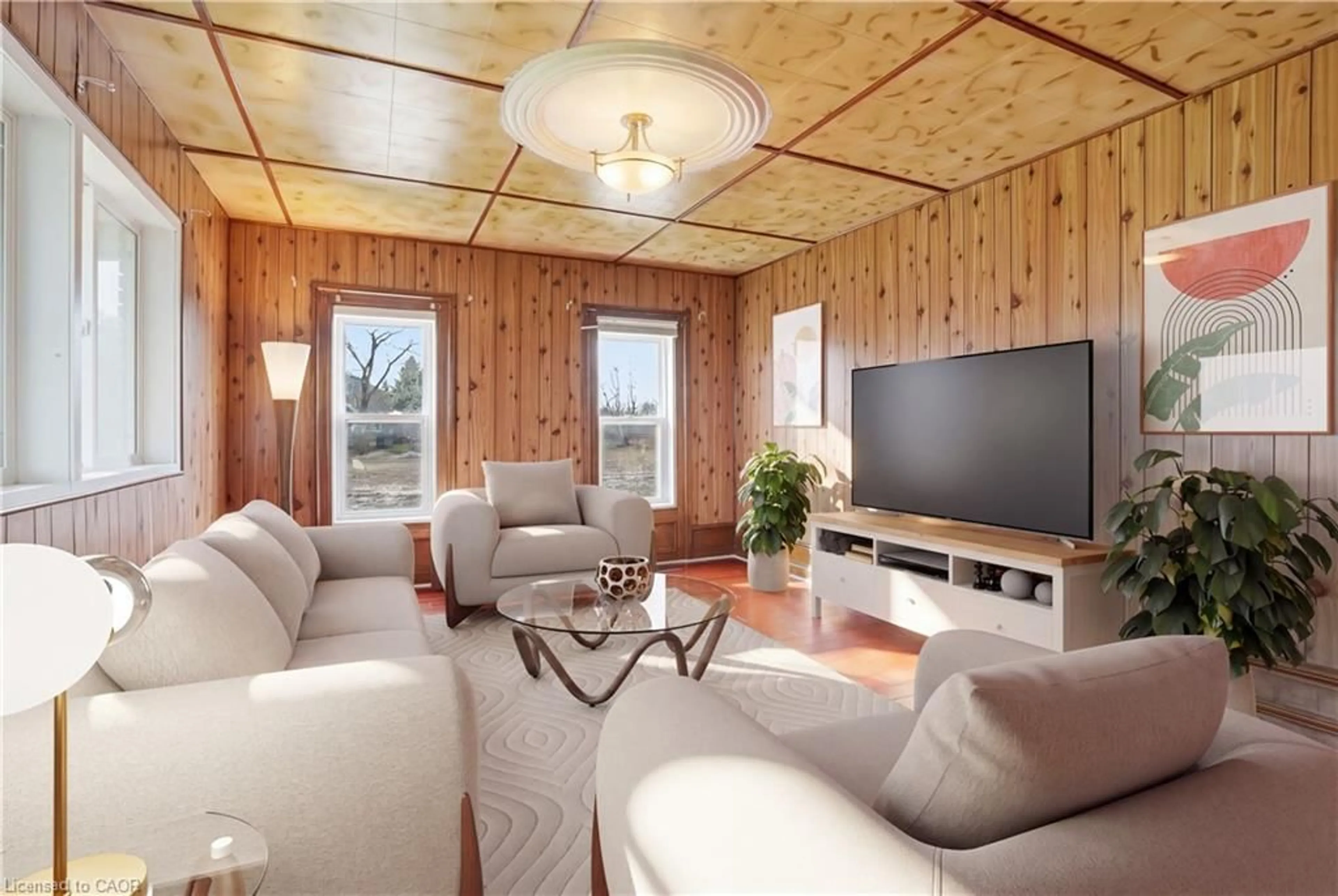 Living room with furniture, wood/laminate floor for 53 Young Rd, Dunnville Ontario N1A 2W7