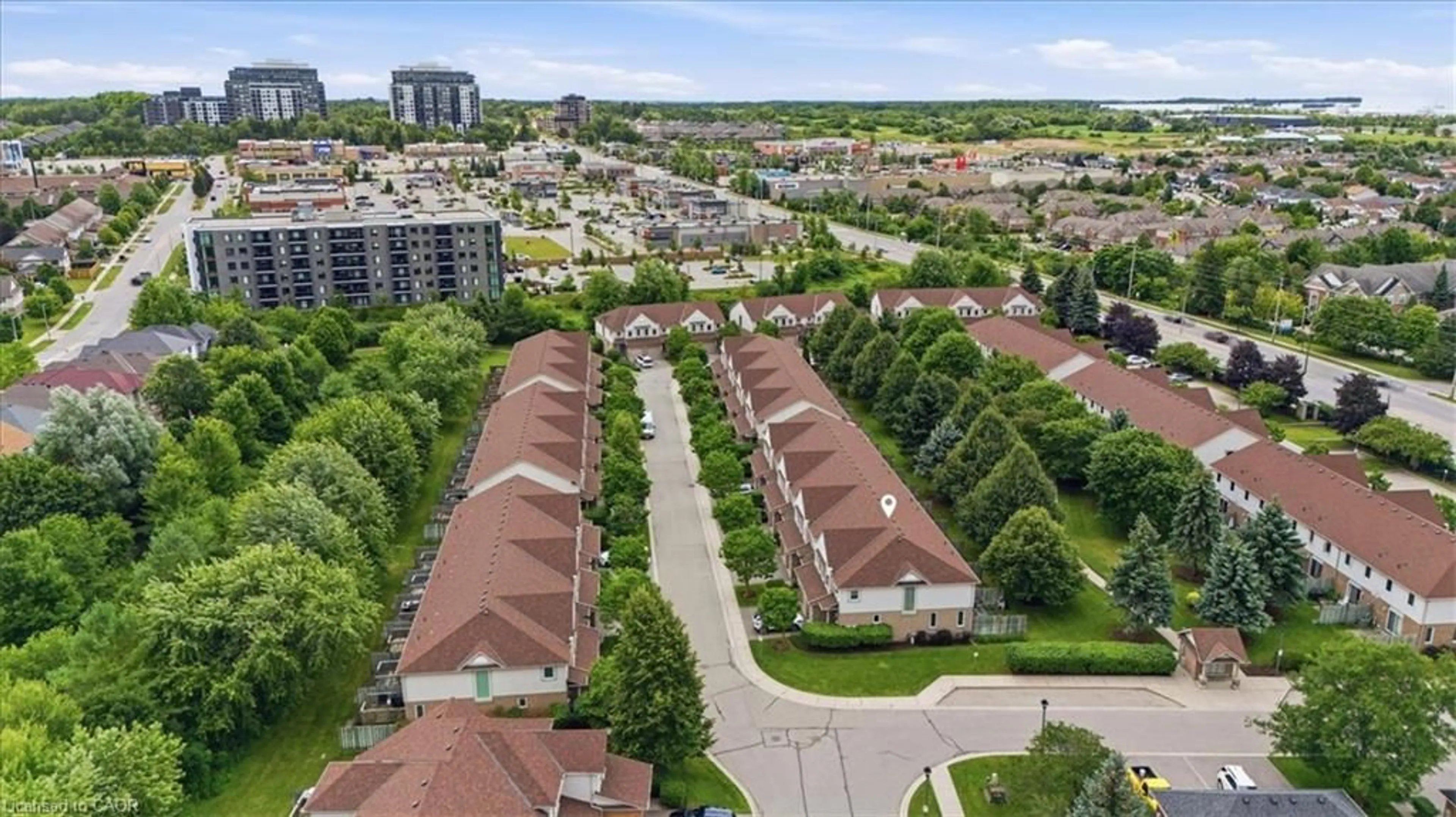 A pic from outside/outdoor area/front of a property/back of a property/a pic from drone, city buildings view from balcony for 15 Roehampton Cres, Guelph Ontario N1L 1M8