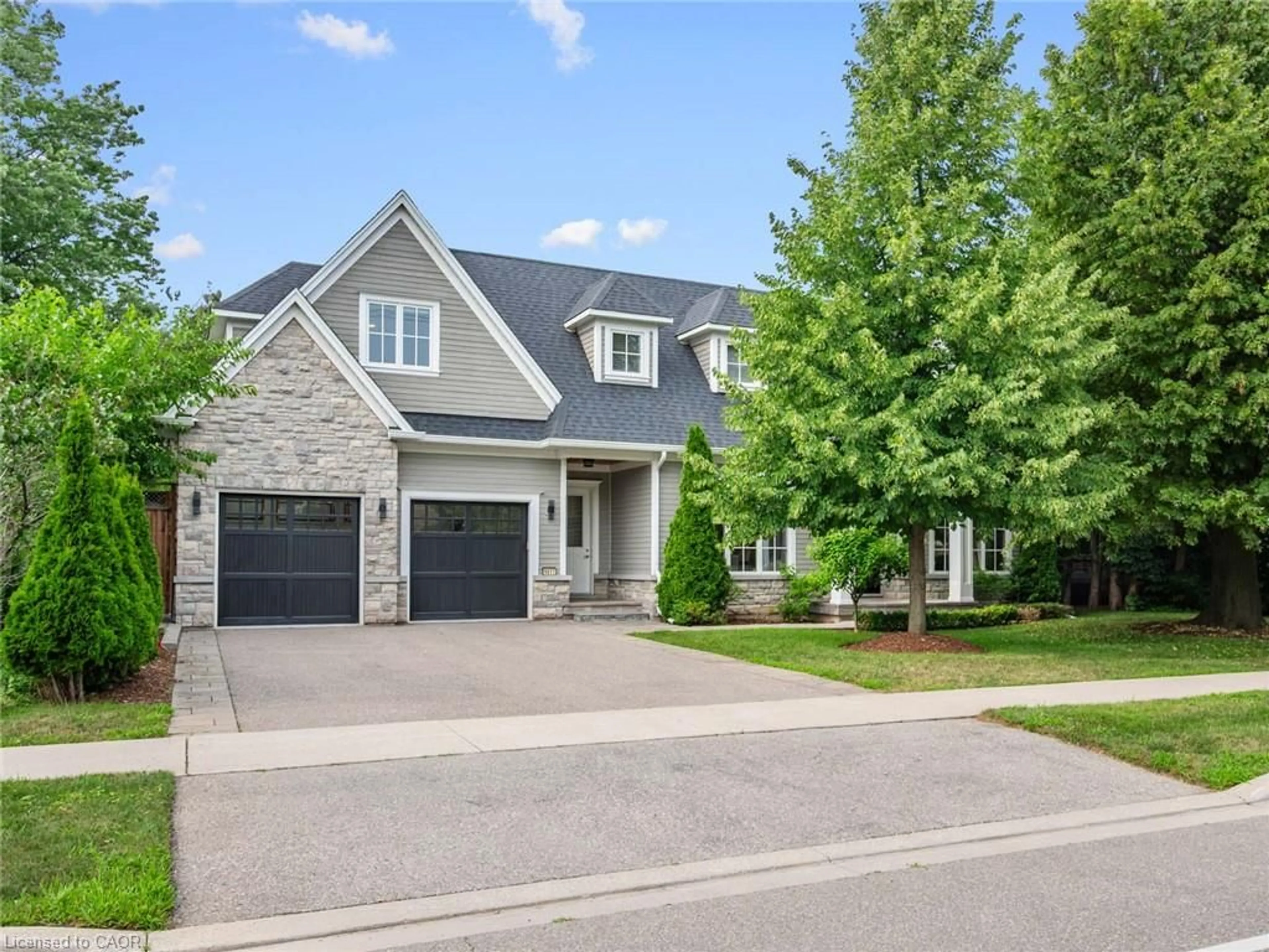 Home with brick exterior material, street for 1077 Bridge Rd, Oakville Ontario L6L 2B6