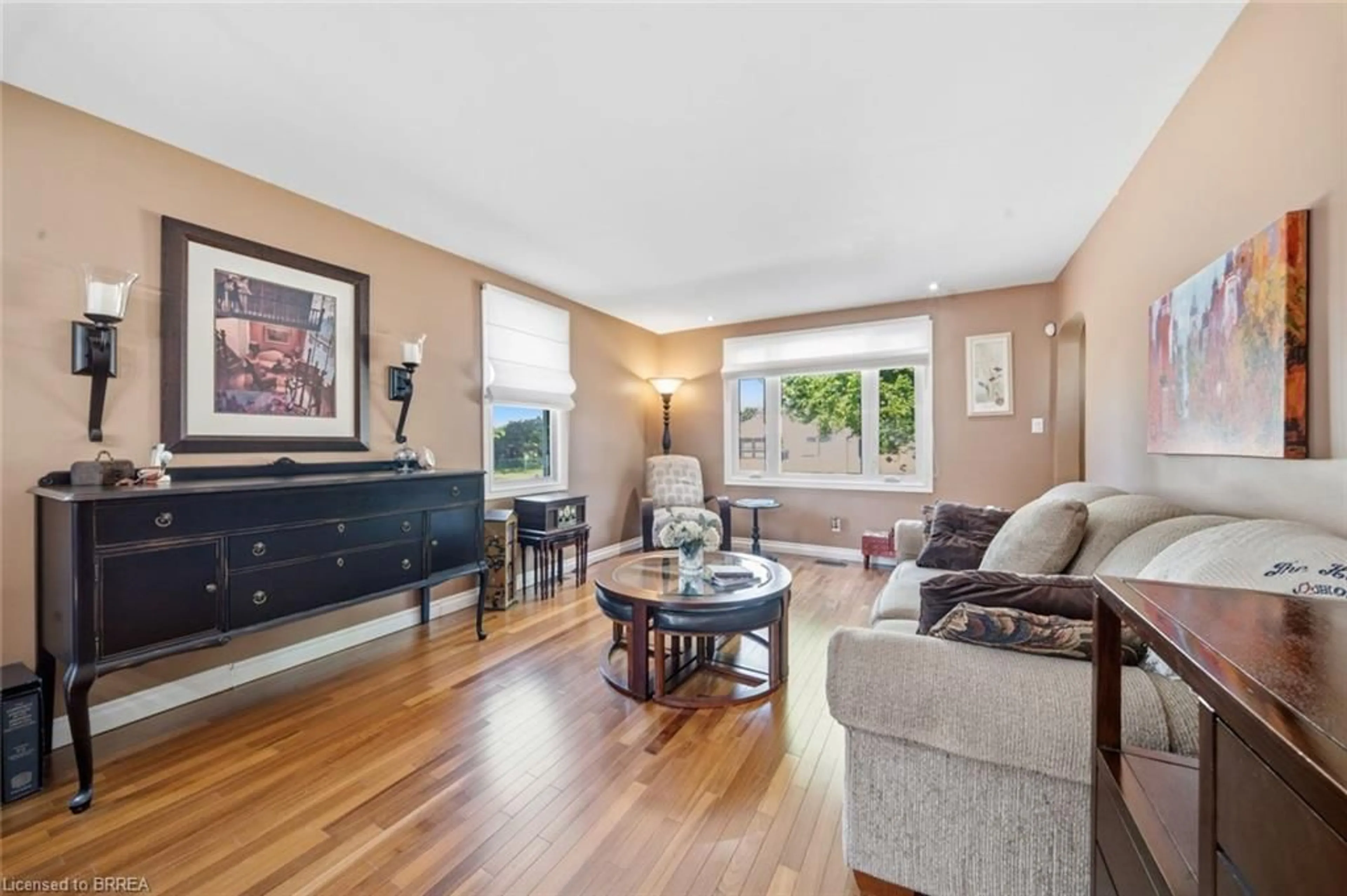 Living room with furniture, wood/laminate floor for 37 Hill Ave, Brantford Ontario N3R 4G8