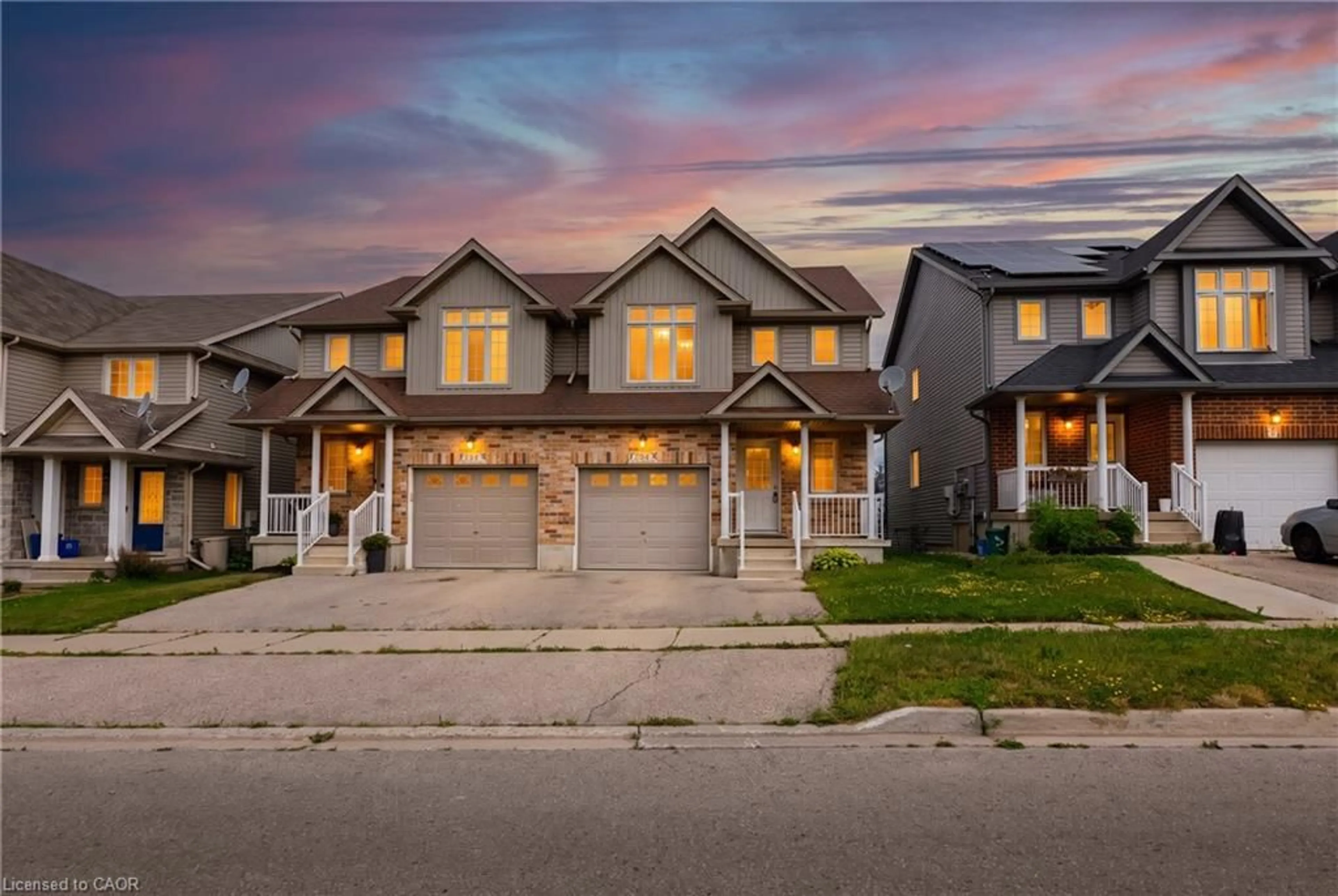 Home with brick exterior material, street for 59 Iron Gate St, Kitchener Ontario N2N 3R7